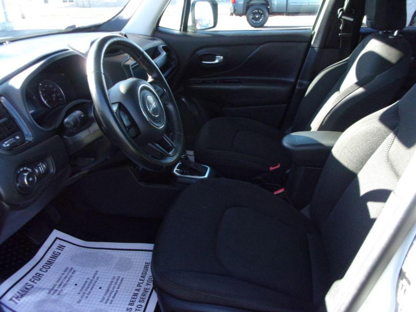 2018 WHITE JEEP RENEGADE ALTITUDE (ZACCJBBB8JP) with an 2.4L engine, Automatic transmission, located at 501 E. Columbia St., Springfield, OH, 45503, (800) 262-7122, 39.925262, -83.801796 - *** New Tires *** Serviced and Detailed *** Customer Preferred Package 2EL Deluxe Cloth High-Back Bucket Seats Altitude Package Black Accent Stitching Exterior Mirrors with Turn Signals 18-Inch x 8.0-Inch Gloss Black Wheels 225/55R18 All Season Tires Black Day Light Opening Moldings Glo - Photo#8