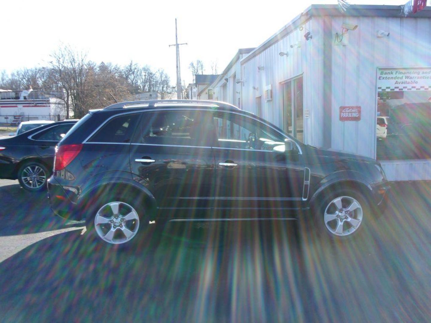 2015 BLUE CHEVROLET CAPTIVA LT (3GNAL3EK2FS) with an 2.4L engine, Automatic transmission, located at 501 E. Columbia St., Springfield, OH, 45503, (800) 262-7122, 39.925262, -83.801796 - Photo#2