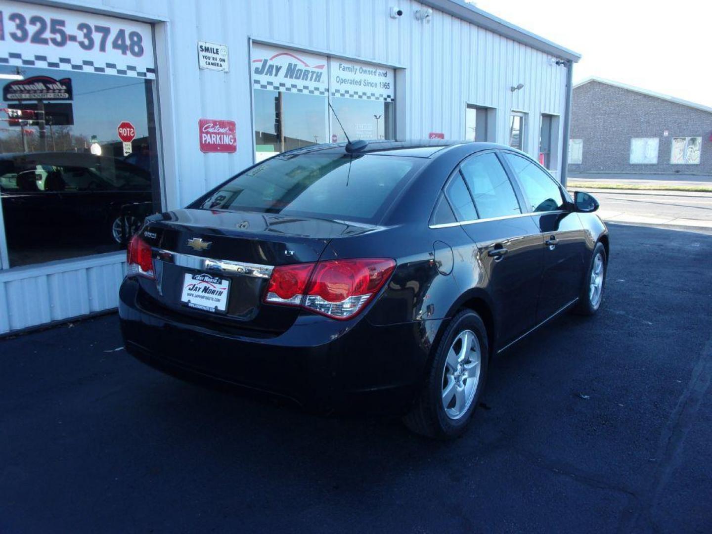 2015 BLACK CHEVROLET CRUZE LT (1G1PC5SB2F7) with an 1.4L engine, Automatic transmission, located at 501 E. Columbia St., Springfield, OH, 45503, (800) 262-7122, 39.925262, -83.801796 - ***Gas Saver***LT***Remote Start***Back-up Camera***Serviced and Detailed*** Jay North Auto has offered hand picked vehicles since 1965! Our customer's enjoy a NO pressure buying experience with a small town feel. All of our vehicles get fully inspected and detailed. We are a preferred dealer fo - Photo#3