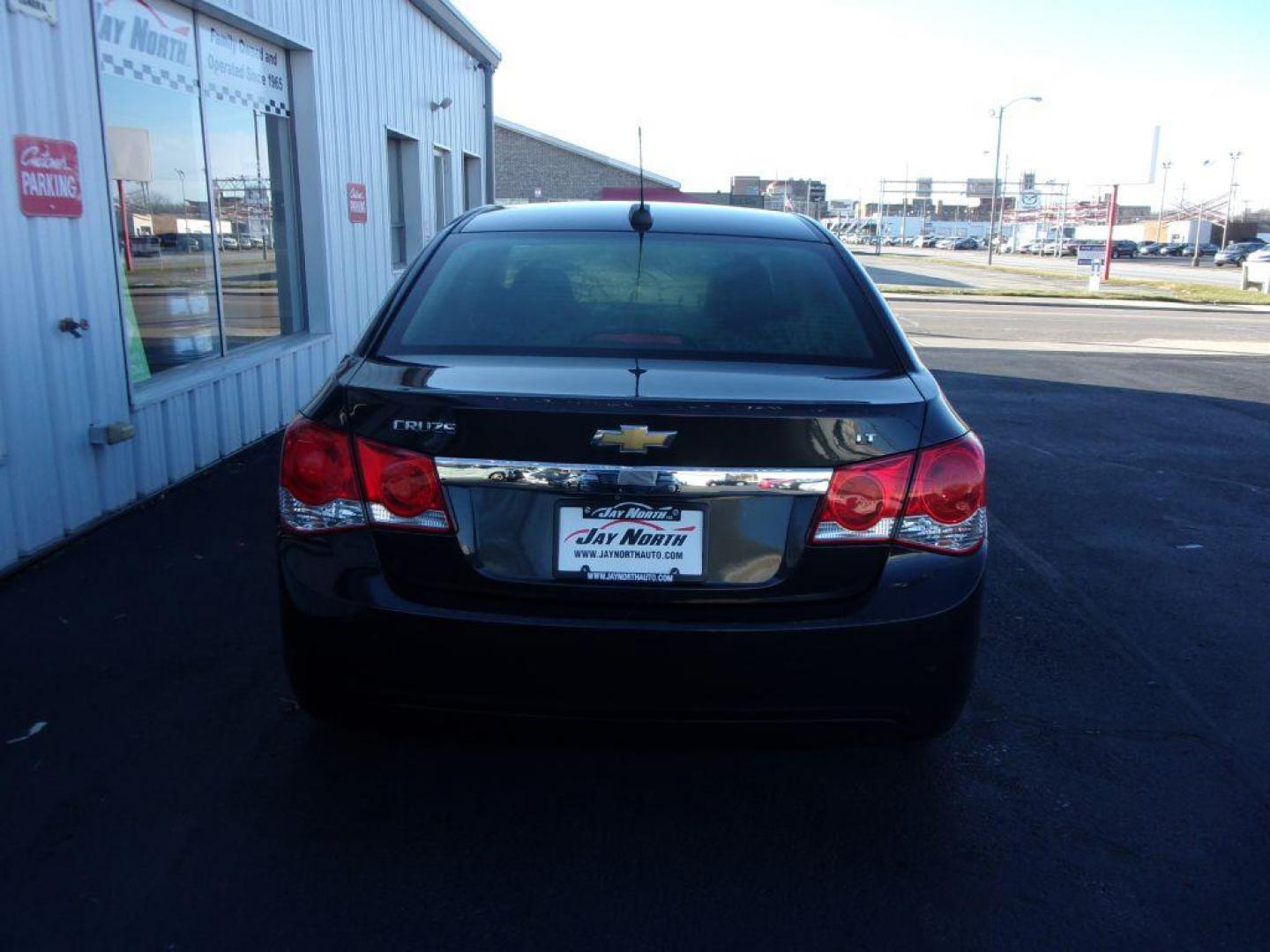 2015 BLACK CHEVROLET CRUZE LT (1G1PC5SB2F7) with an 1.4L engine, Automatic transmission, located at 501 E. Columbia St., Springfield, OH, 45503, (800) 262-7122, 39.925262, -83.801796 - ***Gas Saver***LT***Remote Start***Back-up Camera***Serviced and Detailed*** Jay North Auto has offered hand picked vehicles since 1965! Our customer's enjoy a NO pressure buying experience with a small town feel. All of our vehicles get fully inspected and detailed. We are a preferred dealer fo - Photo#4