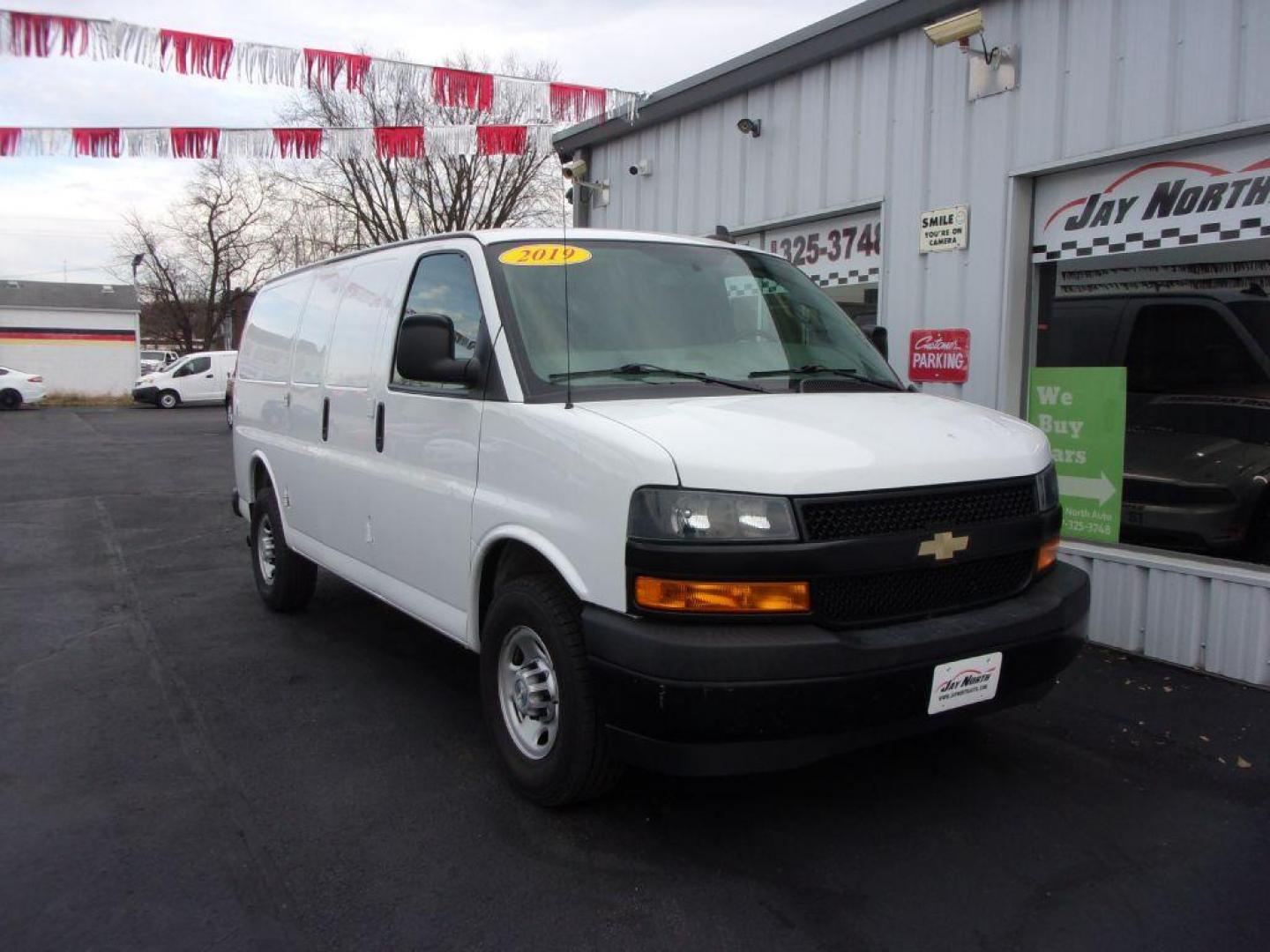 2019 WHITE CHEVROLET EXPRESS G2500 CARGO (1GCWGAFP9K1) with an 4.3L engine, Automatic transmission, located at 501 E. Columbia St., Springfield, OH, 45503, (800) 262-7122, 39.925262, -83.801796 - ***Clean Carfax***1-Owner***Racks and Bins***New Tires***G2500*** Jay North Auto has offered hand picked vehicles since 1965! Our customer's enjoy a NO pressure buying experience with a small town feel. All of our vehicles get fully inspected and detailed. We are a preferred dealer for many loca - Photo#2