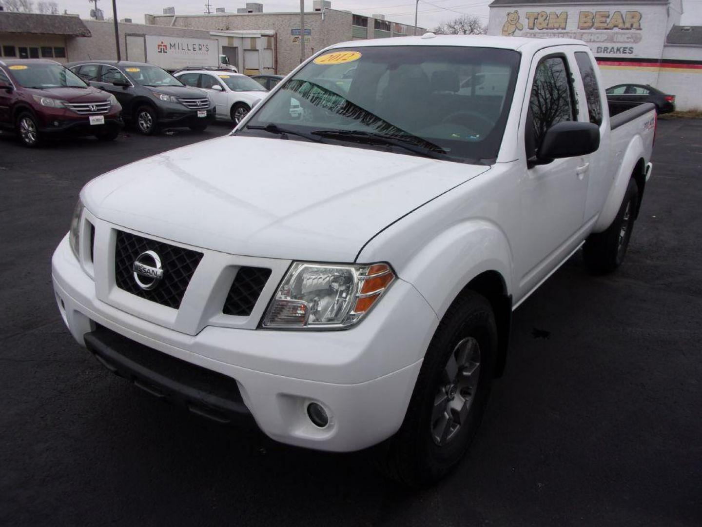 2012 WHITE NISSAN FRONTIER PRO-4X (1N6AD0CW6CC) with an 4.0L engine, Automatic transmission, located at 501 E. Columbia St., Springfield, OH, 45503, (800) 262-7122, 39.925262, -83.801796 - Photo#2