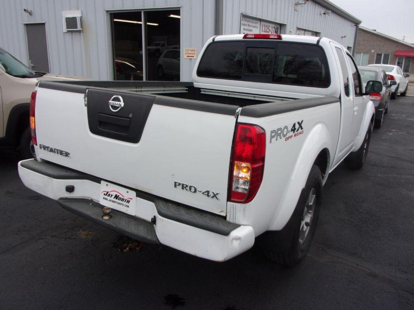 2012 WHITE NISSAN FRONTIER PRO-4X (1N6AD0CW6CC) with an 4.0L engine, Automatic transmission, located at 501 E. Columbia St., Springfield, OH, 45503, (800) 262-7122, 39.925262, -83.801796 - Photo#5