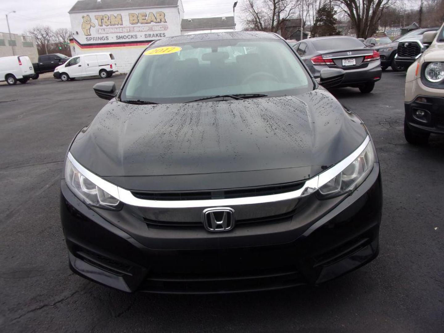 2017 BLACK HONDA CIVIC LX (19XFC2E5XHE) with an 2.0L engine, 6-Speed Manual transmission, located at 501 E. Columbia St., Springfield, OH, 45503, (800) 262-7122, 39.925262, -83.801796 - *** Serviced and Detailed *** Newer Tires *** 6-Speed Manual *** Gas Saver *** LX *** Jay North Auto has offered hand picked vehicles since 1965! Our customer's enjoy a NO pressure buying experience with a small town feel. All of our vehicles get fully inspected and detailed. We are a preferred - Photo#1