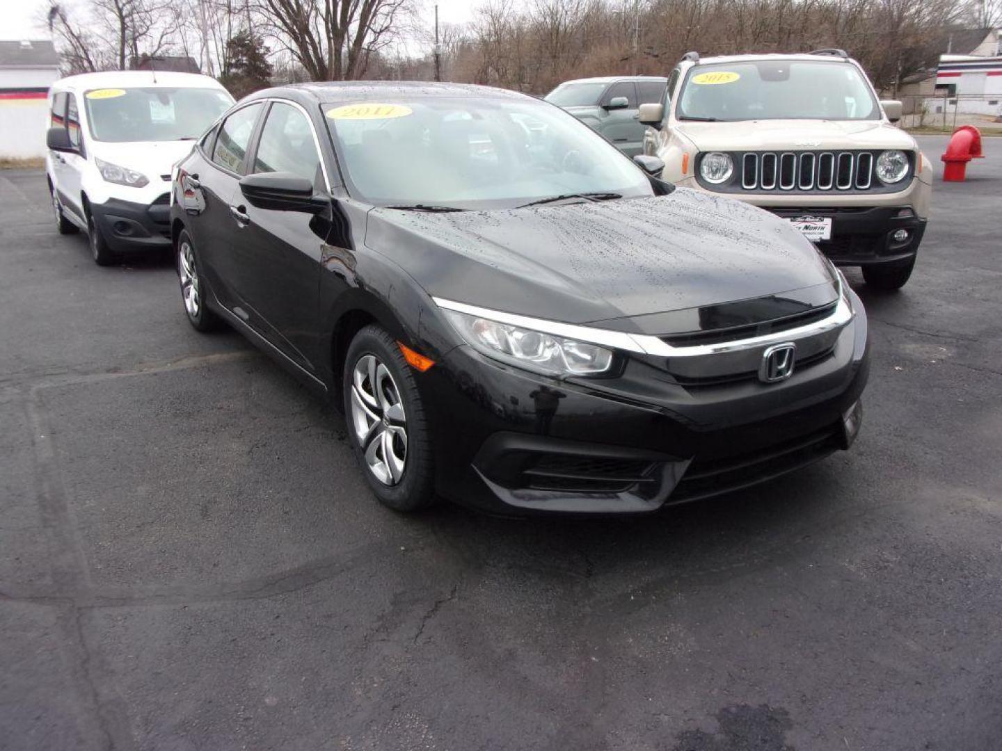 2017 BLACK HONDA CIVIC LX (19XFC2E5XHE) with an 2.0L engine, 6-Speed Manual transmission, located at 501 E. Columbia St., Springfield, OH, 45503, (800) 262-7122, 39.925262, -83.801796 - *** Serviced and Detailed *** Newer Tires *** 6-Speed Manual *** Gas Saver *** LX *** Jay North Auto has offered hand picked vehicles since 1965! Our customer's enjoy a NO pressure buying experience with a small town feel. All of our vehicles get fully inspected and detailed. We are a preferred - Photo#2