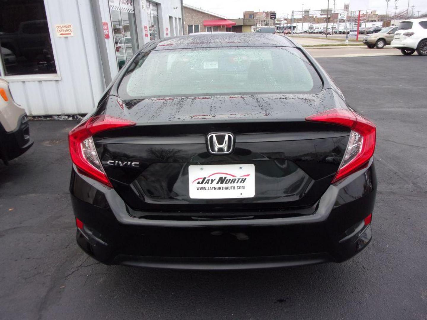 2017 BLACK HONDA CIVIC LX (19XFC2E5XHE) with an 2.0L engine, 6-Speed Manual transmission, located at 501 E. Columbia St., Springfield, OH, 45503, (800) 262-7122, 39.925262, -83.801796 - *** Serviced and Detailed *** Newer Tires *** 6-Speed Manual *** Gas Saver *** LX *** Jay North Auto has offered hand picked vehicles since 1965! Our customer's enjoy a NO pressure buying experience with a small town feel. All of our vehicles get fully inspected and detailed. We are a preferred - Photo#4