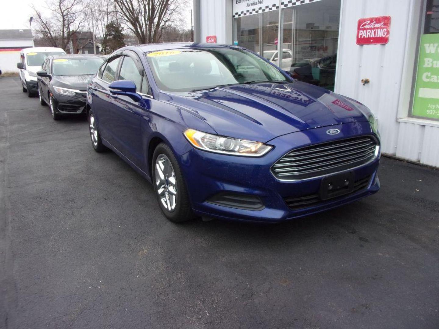 2016 BLUE FORD FUSION SE (1FA6P0H73G5) with an 2.5L engine, Automatic transmission, located at 501 E. Columbia St., Springfield, OH, 45503, (800) 262-7122, 39.925262, -83.801796 - *** NICE *** Serviced and Detailed *** Back Up Camera *** 34 MPG HWY *** Jay North Auto has offered hand picked vehicles since 1965! Our customer's enjoy a NO pressure buying experience with a small town feel. All of our vehicles get fully inspected and detailed. We are a preferred dealer for m - Photo#2