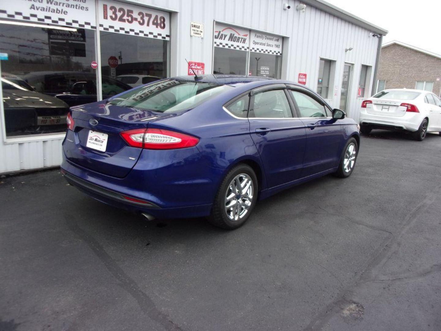 2016 BLUE FORD FUSION SE (1FA6P0H73G5) with an 2.5L engine, Automatic transmission, located at 501 E. Columbia St., Springfield, OH, 45503, (800) 262-7122, 39.925262, -83.801796 - *** NICE *** Serviced and Detailed *** Back Up Camera *** 34 MPG HWY *** Jay North Auto has offered hand picked vehicles since 1965! Our customer's enjoy a NO pressure buying experience with a small town feel. All of our vehicles get fully inspected and detailed. We are a preferred dealer for m - Photo#3