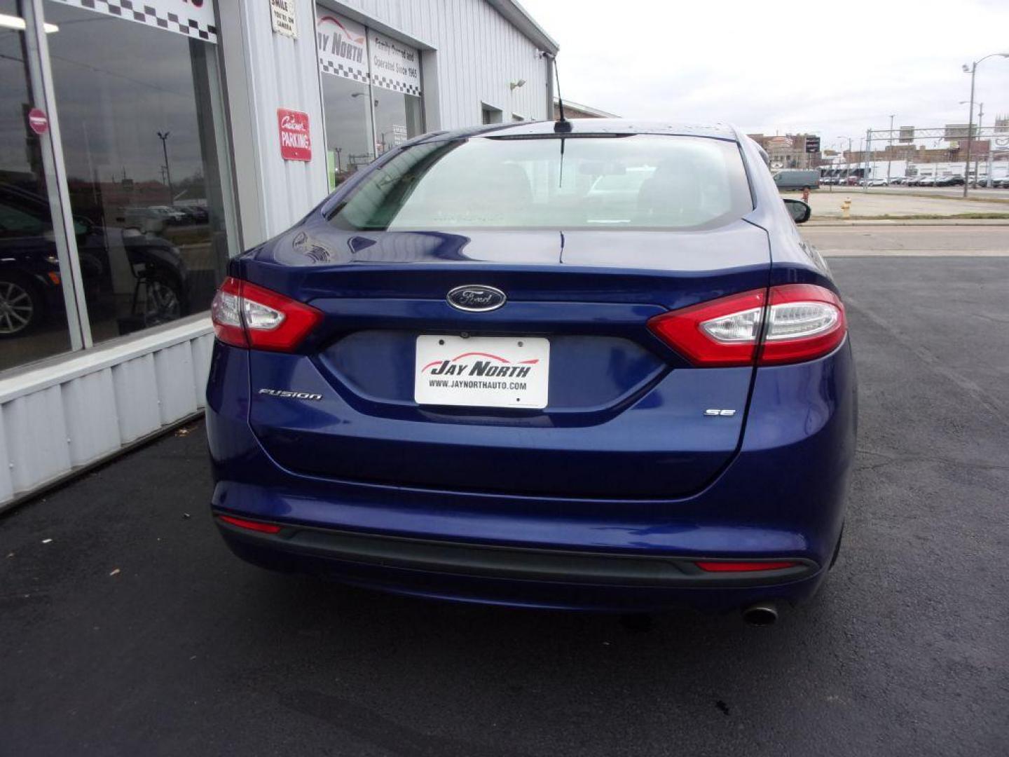 2016 BLUE FORD FUSION SE (1FA6P0H73G5) with an 2.5L engine, Automatic transmission, located at 501 E. Columbia St., Springfield, OH, 45503, (800) 262-7122, 39.925262, -83.801796 - *** NICE *** Serviced and Detailed *** Back Up Camera *** 34 MPG HWY *** Jay North Auto has offered hand picked vehicles since 1965! Our customer's enjoy a NO pressure buying experience with a small town feel. All of our vehicles get fully inspected and detailed. We are a preferred dealer for m - Photo#4