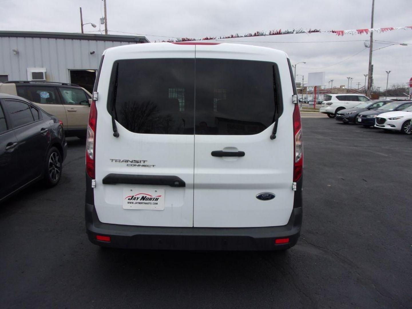 2017 WHITE FORD TRANSIT CONNECT XL (NM0LS7E71H1) with an 2.5L engine, Automatic transmission, located at 501 E. Columbia St., Springfield, OH, 45503, (800) 262-7122, 39.925262, -83.801796 - *** 1 Owner *** Serviced and Detailed *** XL *** Racks and Bin's *** Jay North Auto has offered hand picked vehicles since 1965! Our customer's enjoy a NO pressure buying experience with a small town feel. All of our vehicles get fully inspected and detailed. We are a preferred dealer for many l - Photo#4