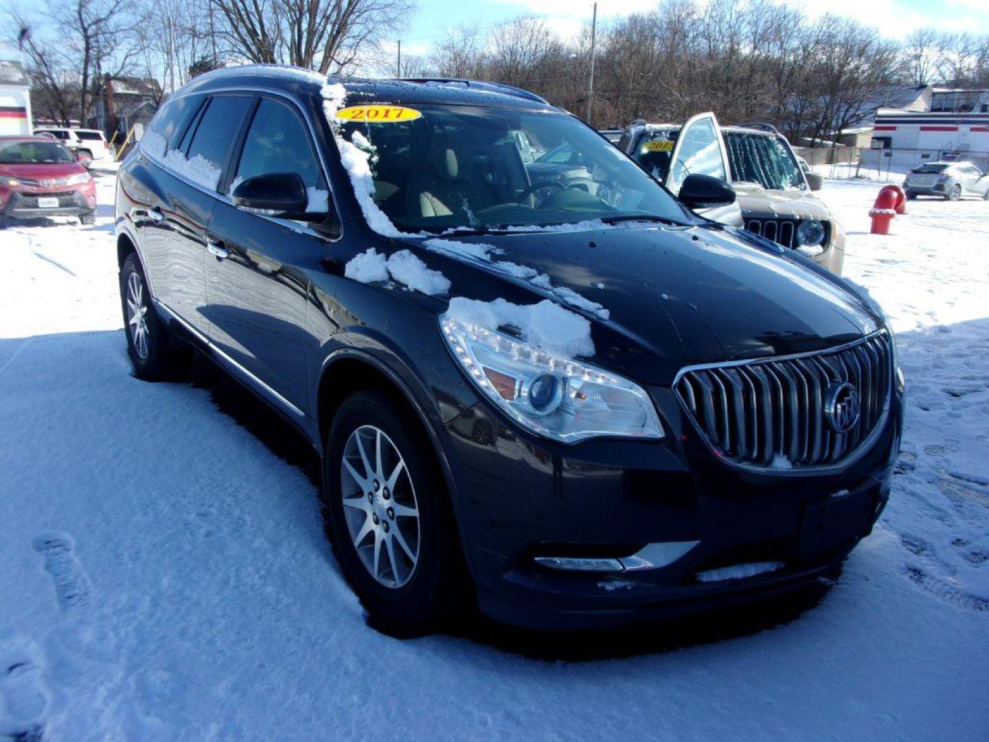 2017 GRAY BUICK ENCLAVE CONVENIENCE (5GAKRAKD7HJ) with an 3.6L engine, Automatic transmission, located at 501 E. Columbia St., Springfield, OH, 45503, (800) 262-7122, 39.925262, -83.801796 - *** Clean CarFax *** V6 fwd *** Serviced and Detailed *** NICE! *** 3rd Row Seating *** Back Up Camera *** Premium Audio w/ Touchscreen *** Power Liftgate *** Jay North Auto has offered hand picked vehicles since 1965! Our customer's enjoy a NO pressure buying experience with a small town feel. - Photo#1