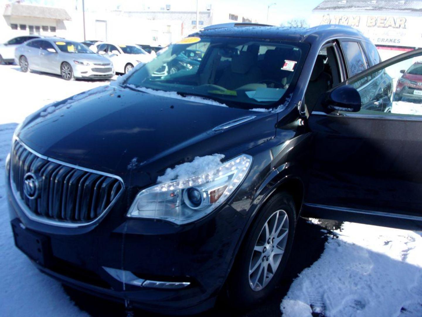 2017 GRAY BUICK ENCLAVE CONVENIENCE (5GAKRAKD7HJ) with an 3.6L engine, Automatic transmission, located at 501 E. Columbia St., Springfield, OH, 45503, (800) 262-7122, 39.925262, -83.801796 - *** Clean CarFax *** V6 fwd *** Serviced and Detailed *** NICE! *** 3rd Row Seating *** Back Up Camera *** Premium Audio w/ Touchscreen *** Power Liftgate *** Jay North Auto has offered hand picked vehicles since 1965! Our customer's enjoy a NO pressure buying experience with a small town feel. - Photo#3