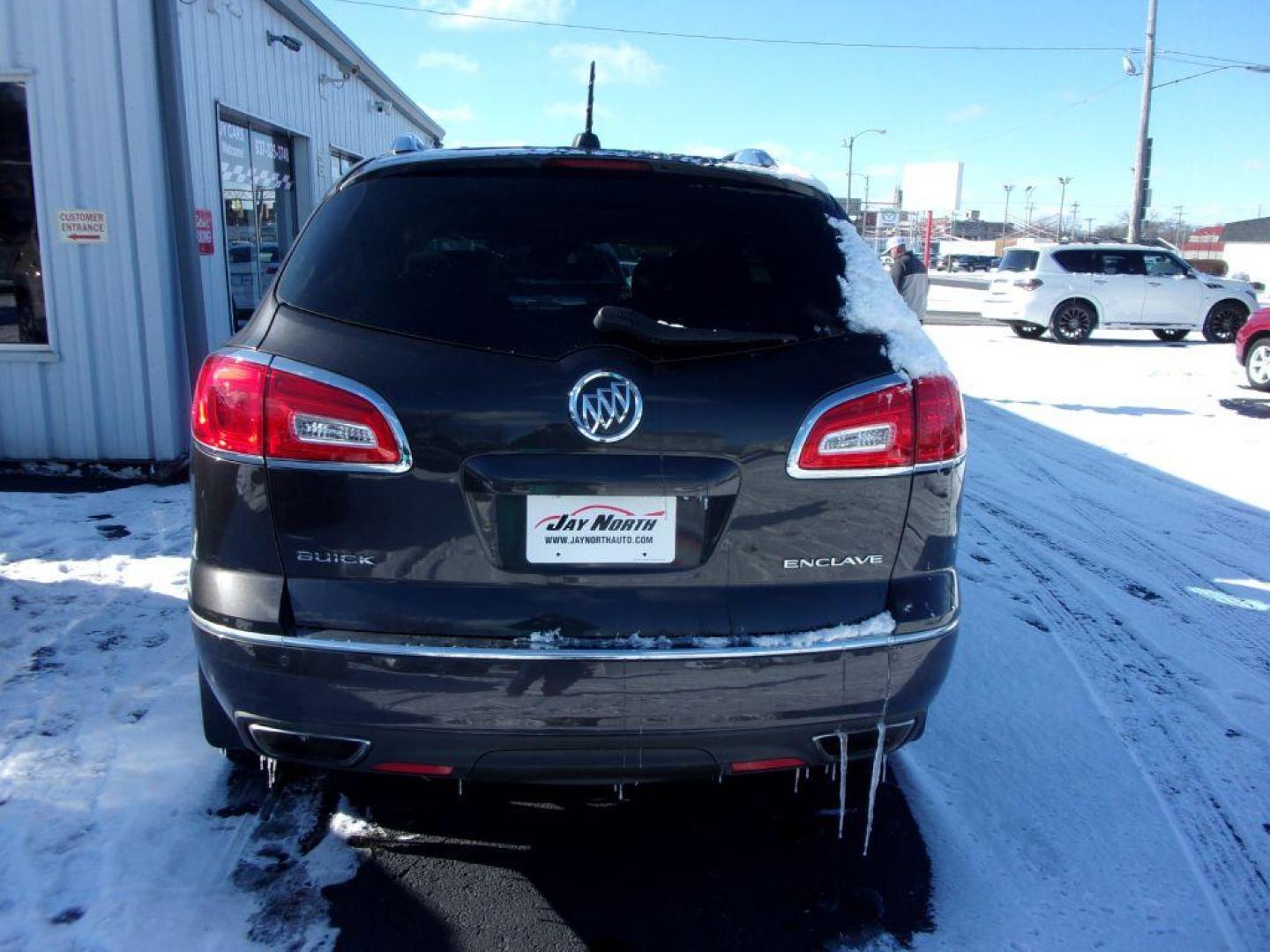 2017 GRAY BUICK ENCLAVE CONVENIENCE (5GAKRAKD7HJ) with an 3.6L engine, Automatic transmission, located at 501 E. Columbia St., Springfield, OH, 45503, (800) 262-7122, 39.925262, -83.801796 - *** Clean CarFax *** V6 fwd *** Serviced and Detailed *** NICE! *** 3rd Row Seating *** Back Up Camera *** Premium Audio w/ Touchscreen *** Power Liftgate *** Jay North Auto has offered hand picked vehicles since 1965! Our customer's enjoy a NO pressure buying experience with a small town feel. - Photo#5