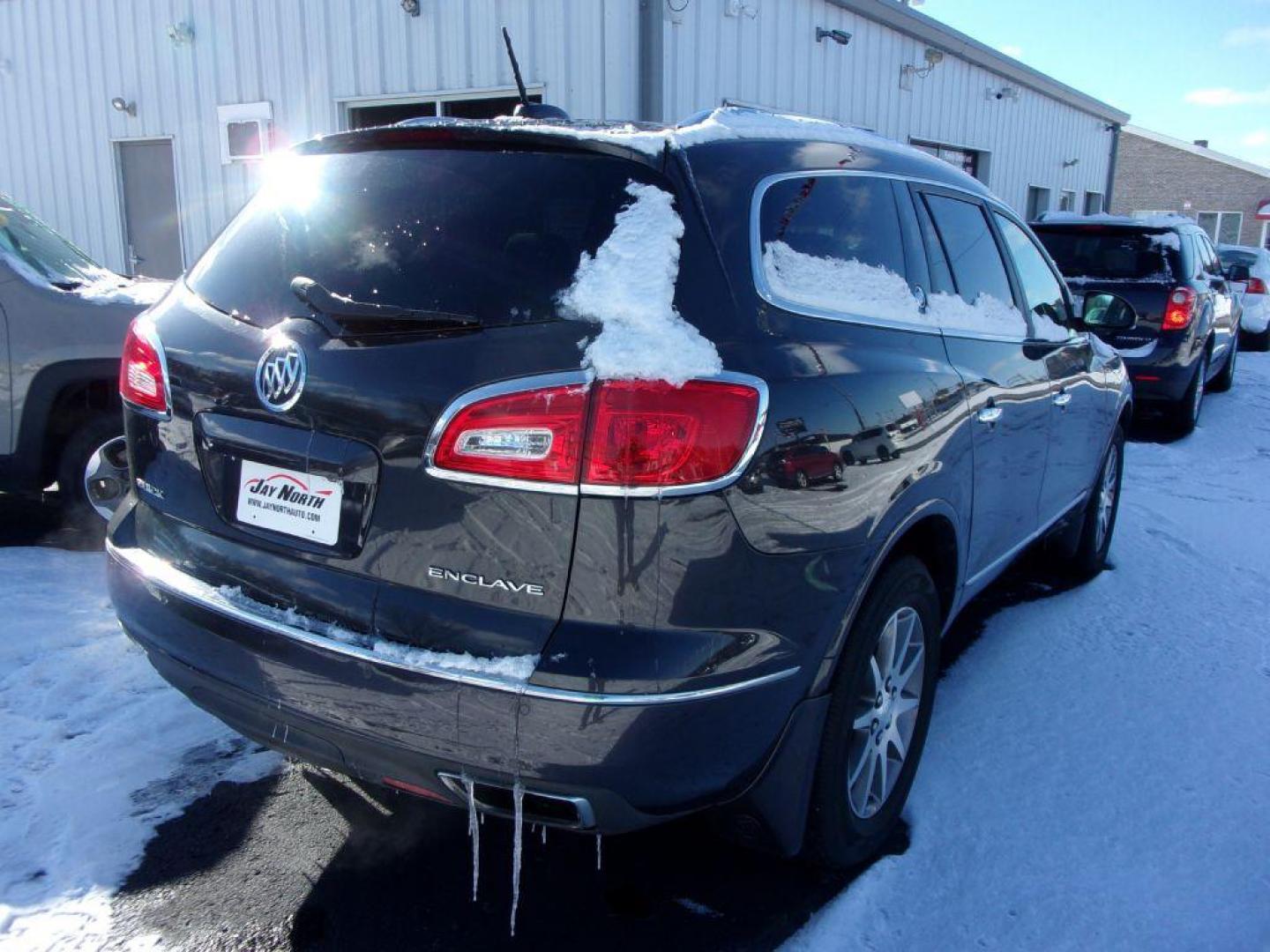 2017 GRAY BUICK ENCLAVE CONVENIENCE (5GAKRAKD7HJ) with an 3.6L engine, Automatic transmission, located at 501 E. Columbia St., Springfield, OH, 45503, (800) 262-7122, 39.925262, -83.801796 - *** Clean CarFax *** V6 fwd *** Serviced and Detailed *** NICE! *** 3rd Row Seating *** Back Up Camera *** Premium Audio w/ Touchscreen *** Power Liftgate *** Jay North Auto has offered hand picked vehicles since 1965! Our customer's enjoy a NO pressure buying experience with a small town feel. - Photo#6