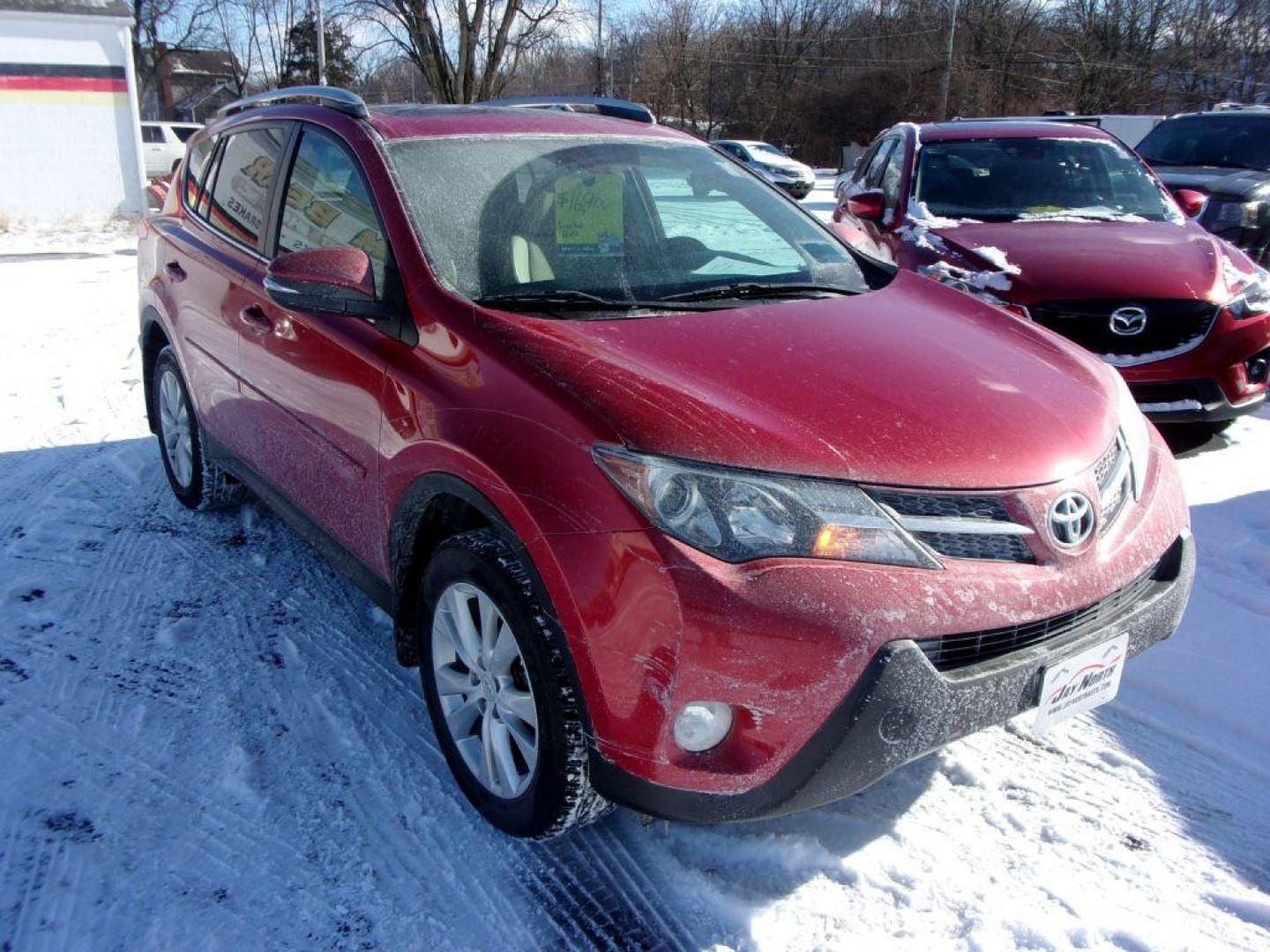 2014 RED TOYOTA RAV4 LIMITED (2T3DFREV4EW) with an 2.5L engine, Automatic transmission, located at 501 E. Columbia St., Springfield, OH, 45503, (800) 262-7122, 39.925262, -83.801796 - Photo#1