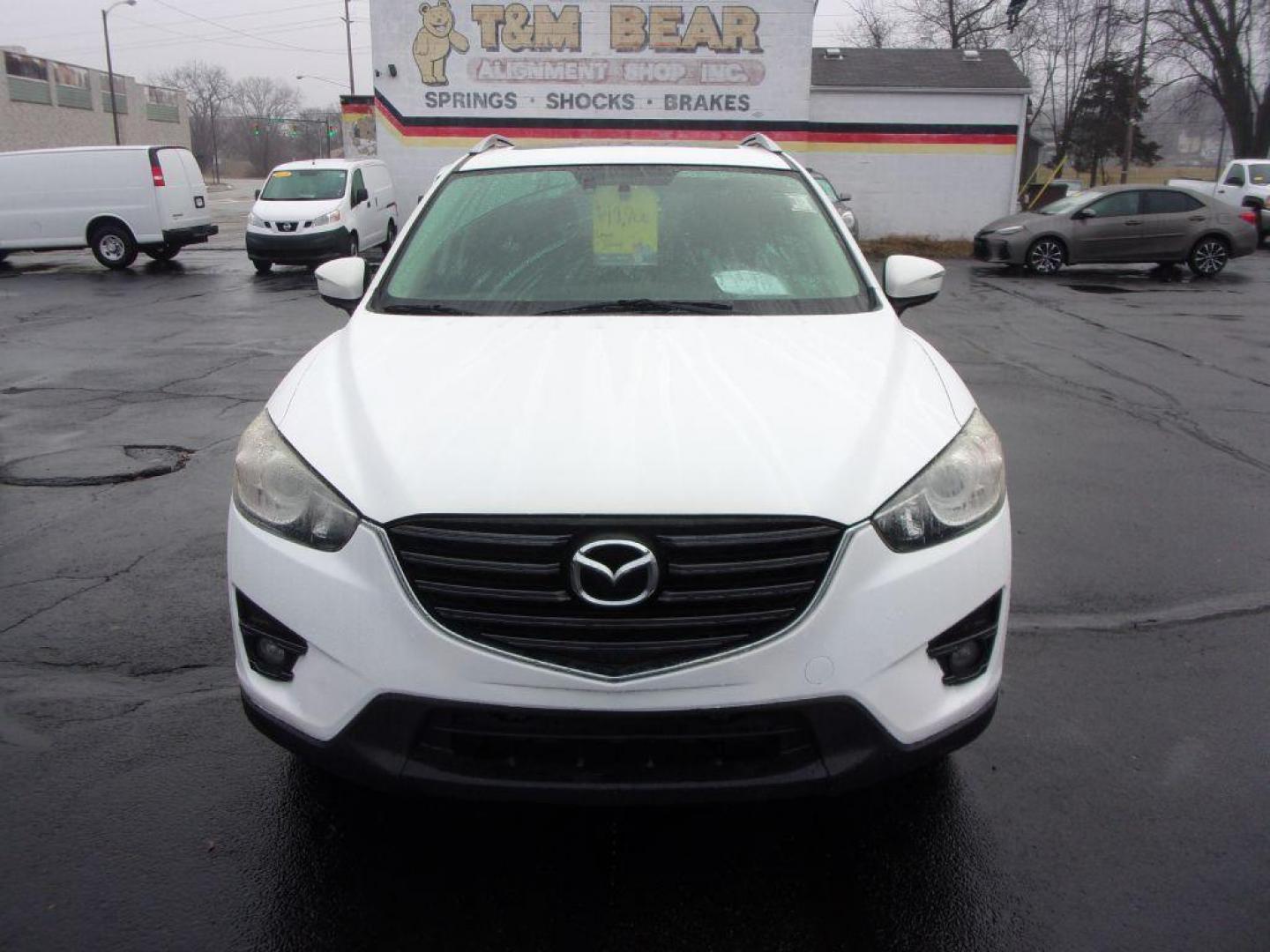 2016 WHITE MAZDA CX-5 GRAND TOURING (JM3KE2DYXG0) with an 2.5L engine, Automatic transmission, located at 501 E. Columbia St., Springfield, OH, 45503, (800) 262-7122, 39.925262, -83.801796 - Photo#1