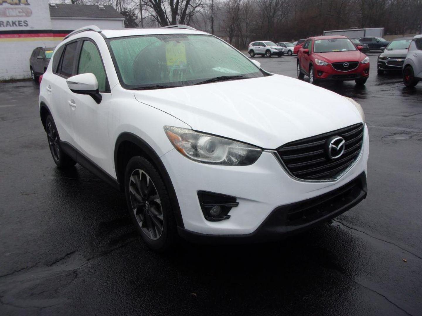 2016 WHITE MAZDA CX-5 GRAND TOURING (JM3KE2DYXG0) with an 2.5L engine, Automatic transmission, located at 501 E. Columbia St., Springfield, OH, 45503, (800) 262-7122, 39.925262, -83.801796 - Photo#2