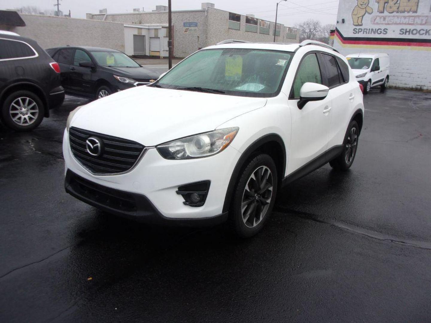 2016 WHITE MAZDA CX-5 GRAND TOURING (JM3KE2DYXG0) with an 2.5L engine, Automatic transmission, located at 501 E. Columbia St., Springfield, OH, 45503, (800) 262-7122, 39.925262, -83.801796 - Photo#6