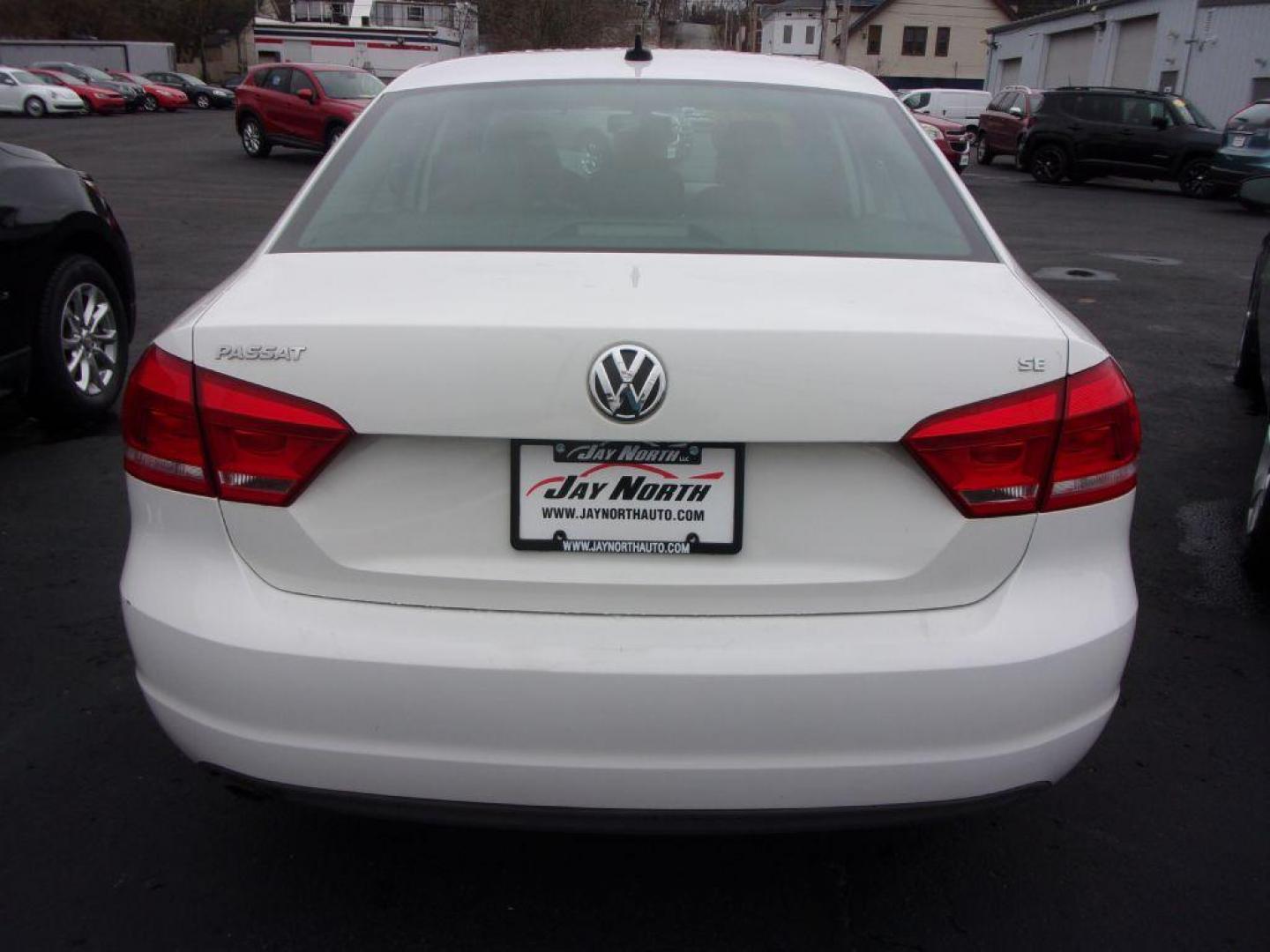 2013 WHITE VOLKSWAGEN PASSAT SE (1VWBP7A36DC) with an 2.5L engine, Automatic transmission, located at 501 E. Columbia St., Springfield, OH, 45503, (800) 262-7122, 39.925262, -83.801796 - *** SE *** Serviced and Detailed *** Leather *** Heated Seats *** Jay North Auto has offered hand picked vehicles since 1965! Our customer's enjoy a NO pressure buying experience with a small town feel. All of our vehicles get fully inspected and detailed. We are a preferred dealer for many loc - Photo#6