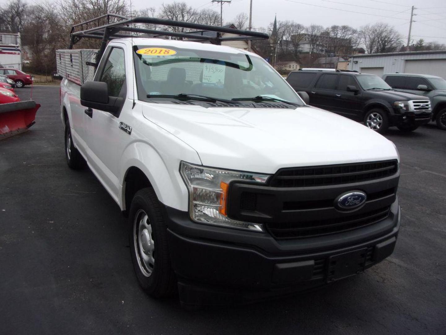 2018 WHITE FORD F150 XL LONG BED (1FTMF1CB0JK) with an 3.3L engine, Automatic transmission, located at 501 E. Columbia St., Springfield, OH, 45503, (800) 262-7122, 39.925262, -83.801796 - *** 1 Owner *** Work Truck w/ Racks and Side Bins *** Serviced and Detailed *** V6 *** Long Bed *** EQUIPMENT GROUP 100A XL SERIES .17'' SILVER STEEL WHEELS .245/70R 17 BSW ALL-SEASON 3.55 RATIO REGULAR AXLE 6170# GVWR PACKAGE FRONT LICENSE PLATE BRACKET VINYL 40/20/40 FRONT FLEX FUEL V - Photo#2