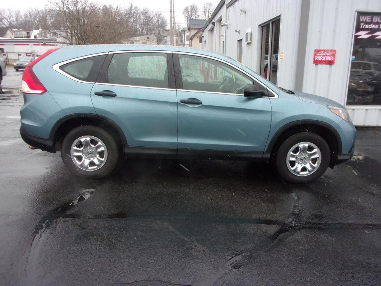 2014 BLUE HONDA CR-V LX (2HKRM4H34EH) with an 2.4L engine, Automatic transmission, located at 501 E. Columbia St., Springfield, OH, 45503, (800) 262-7122, 39.925262, -83.801796 - Photo#0