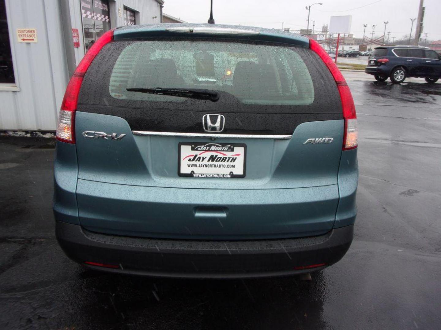 2014 BLUE HONDA CR-V LX (2HKRM4H34EH) with an 2.4L engine, Automatic transmission, located at 501 E. Columbia St., Springfield, OH, 45503, (800) 262-7122, 39.925262, -83.801796 - Photo#5