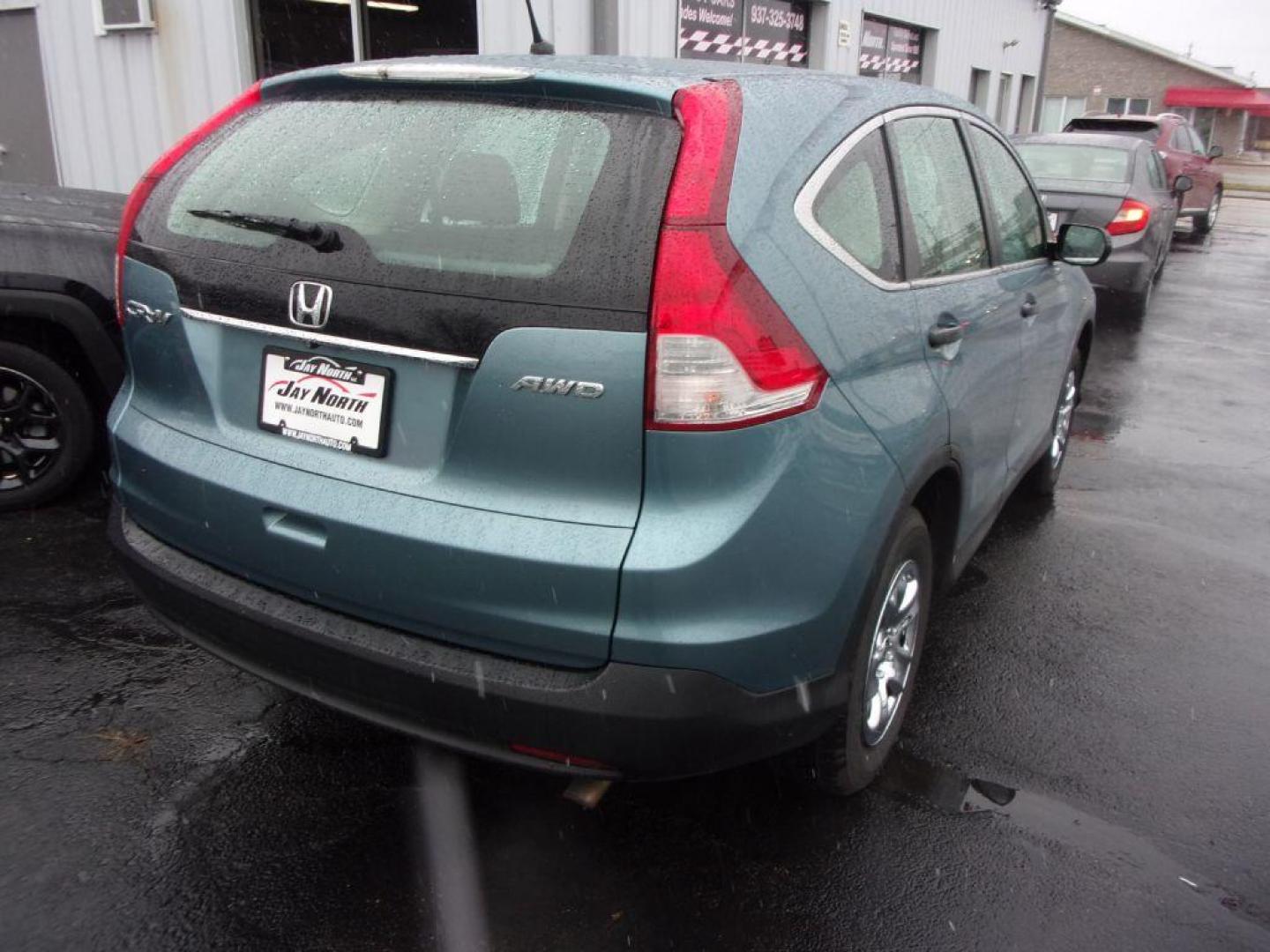 2014 BLUE HONDA CR-V LX (2HKRM4H34EH) with an 2.4L engine, Automatic transmission, located at 501 E. Columbia St., Springfield, OH, 45503, (800) 262-7122, 39.925262, -83.801796 - Photo#6