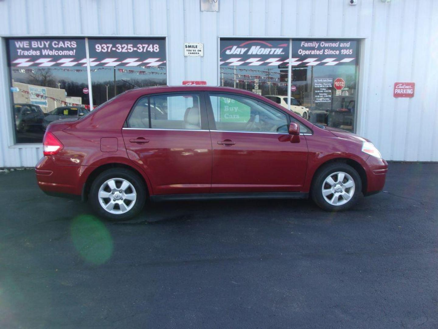 2007 RED NISSAN VERSA S (3N1BC11E77L) with an 1.8L engine, Automatic transmission, located at 501 E. Columbia St., Springfield, OH, 45503, (800) 262-7122, 39.925262, -83.801796 - Photo#0