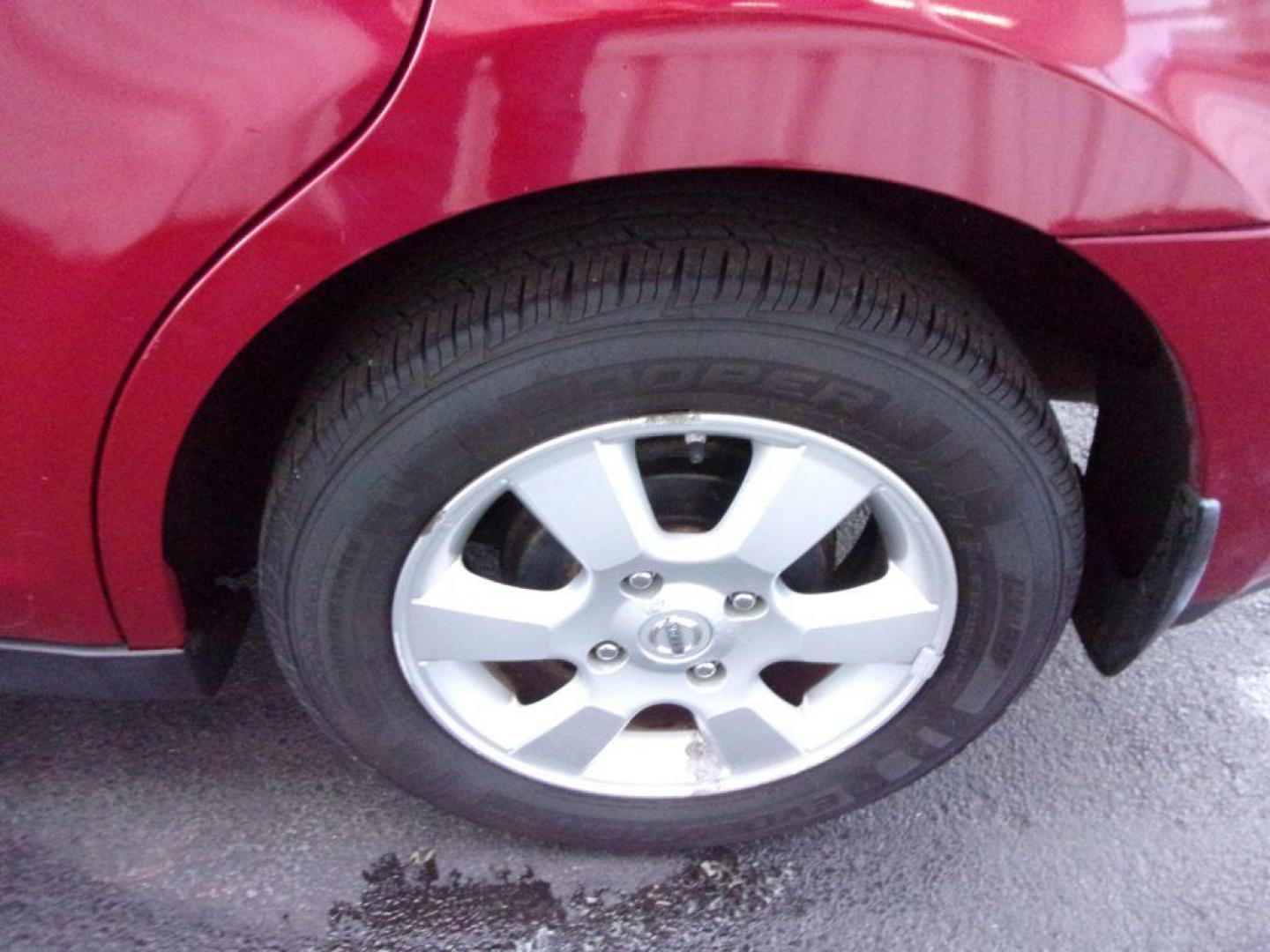 2007 RED NISSAN VERSA S (3N1BC11E77L) with an 1.8L engine, Automatic transmission, located at 501 E. Columbia St., Springfield, OH, 45503, (800) 262-7122, 39.925262, -83.801796 - Photo#23