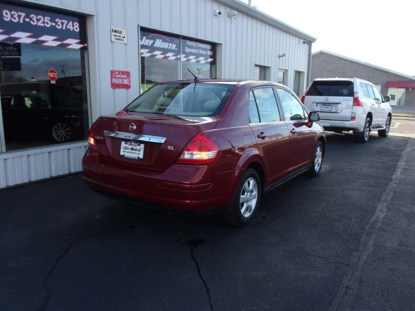 2007 RED NISSAN VERSA S (3N1BC11E77L) with an 1.8L engine, Automatic transmission, located at 501 E. Columbia St., Springfield, OH, 45503, (800) 262-7122, 39.925262, -83.801796 - Photo#3