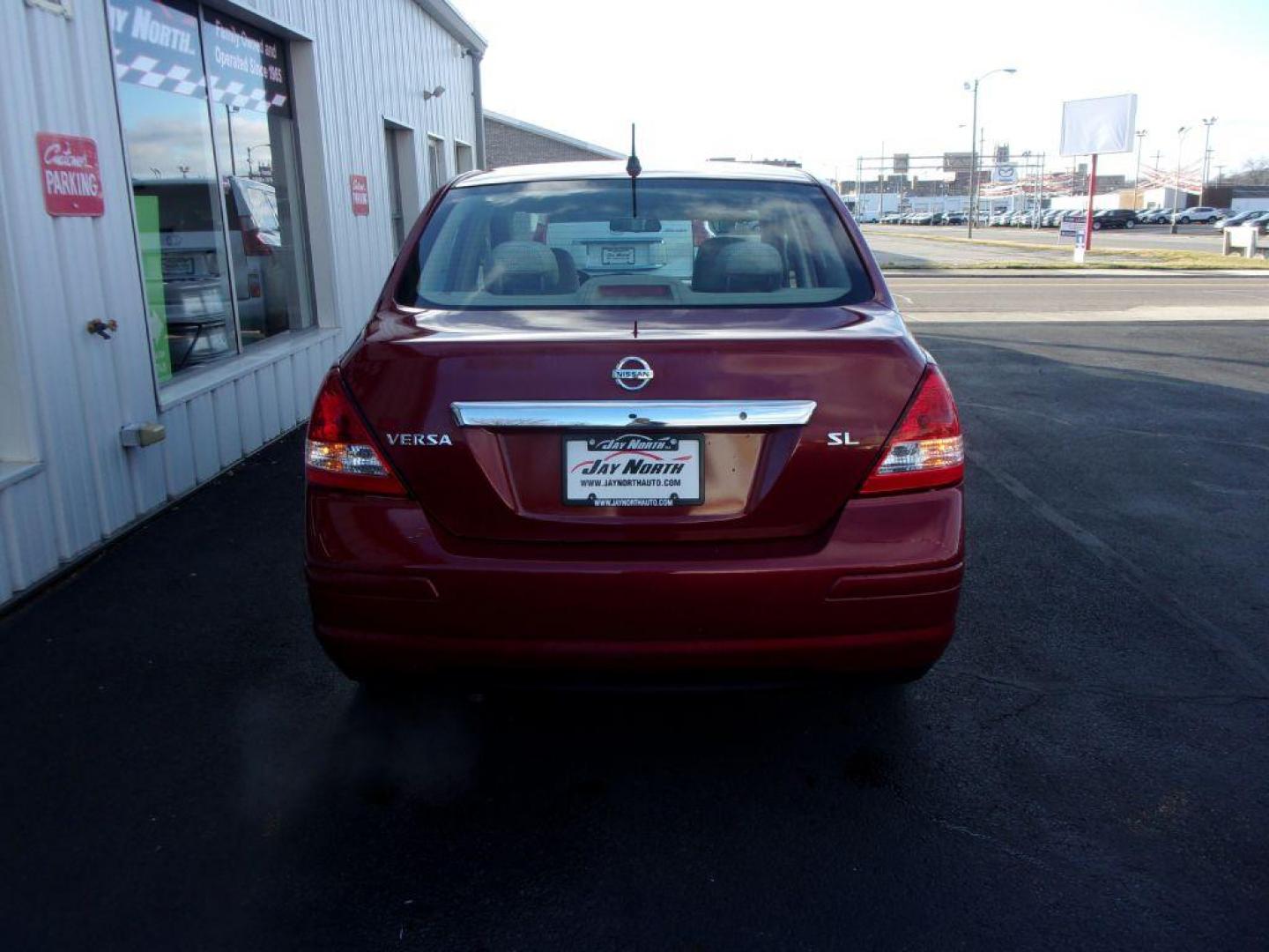 2007 RED NISSAN VERSA S (3N1BC11E77L) with an 1.8L engine, Automatic transmission, located at 501 E. Columbia St., Springfield, OH, 45503, (800) 262-7122, 39.925262, -83.801796 - Photo#4