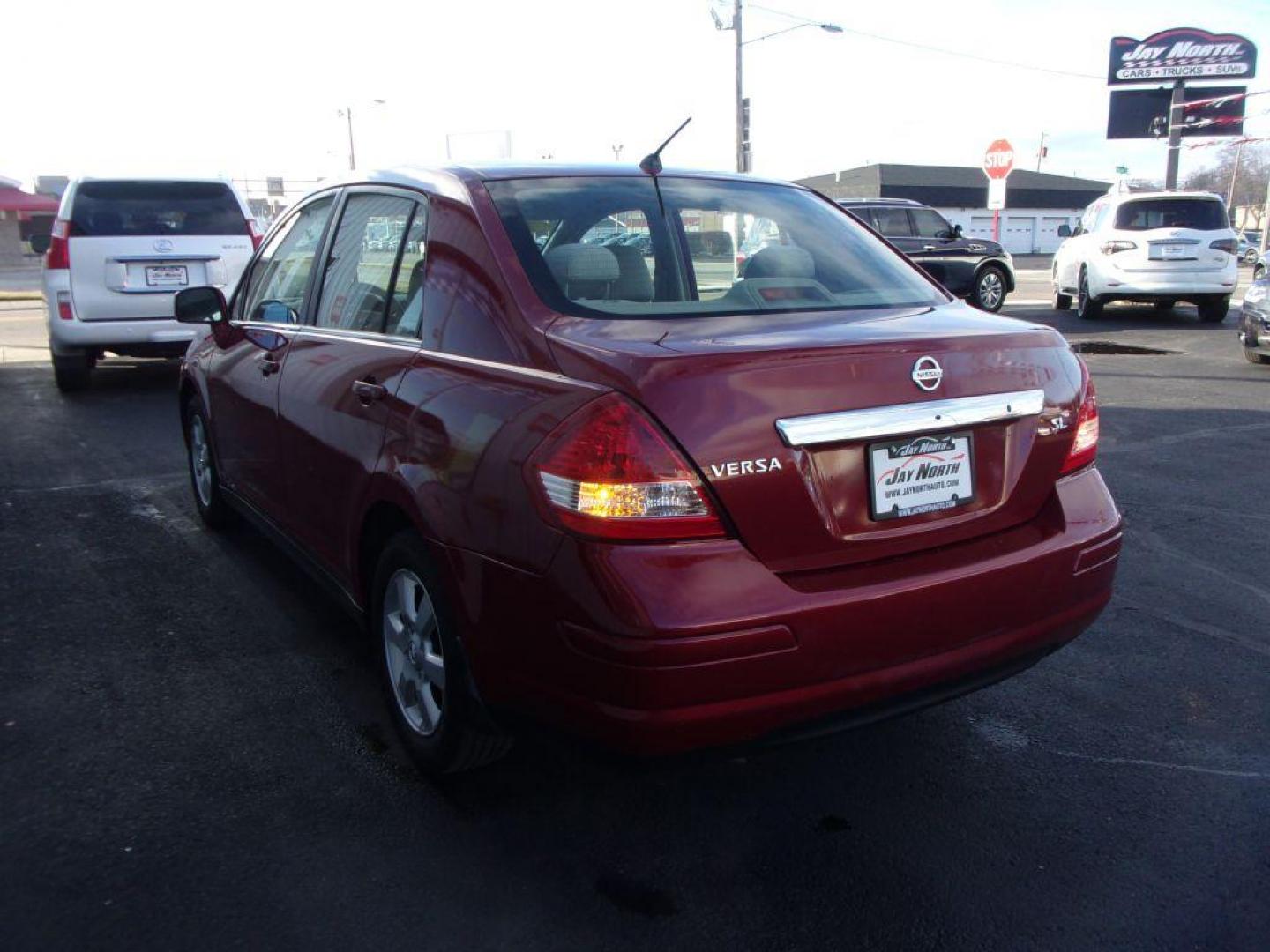 2007 RED NISSAN VERSA S (3N1BC11E77L) with an 1.8L engine, Automatic transmission, located at 501 E. Columbia St., Springfield, OH, 45503, (800) 262-7122, 39.925262, -83.801796 - Photo#5