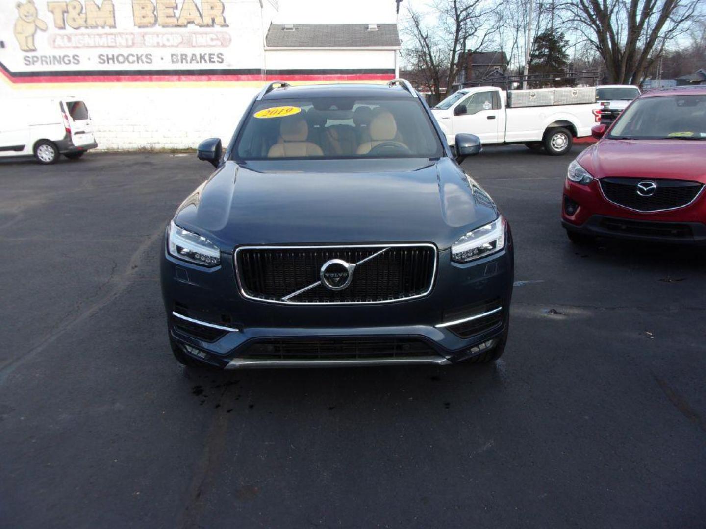 2019 BLUE VOLVO XC90 T6 MOMENTUM (YV4A22PK8K1) with an 2.0L engine, Automatic transmission, located at 501 E. Columbia St., Springfield, OH, 45503, (800) 262-7122, 39.925262, -83.801796 - *** 1 Owner *** LOADED *** Serviced and Detailed *** Third Row Seating *** PERFORMANCE 2.0L Super and Turbo-Charged, Direct Inject Engine 8-Speed Geartronic Automatic Trans w/ Start-Stop 316 HP @ 5700 RPM and 295 lb-ft Torque @ 2200 RPM All-Wheel-Drive with Instant Traction Electric Power - Photo#1