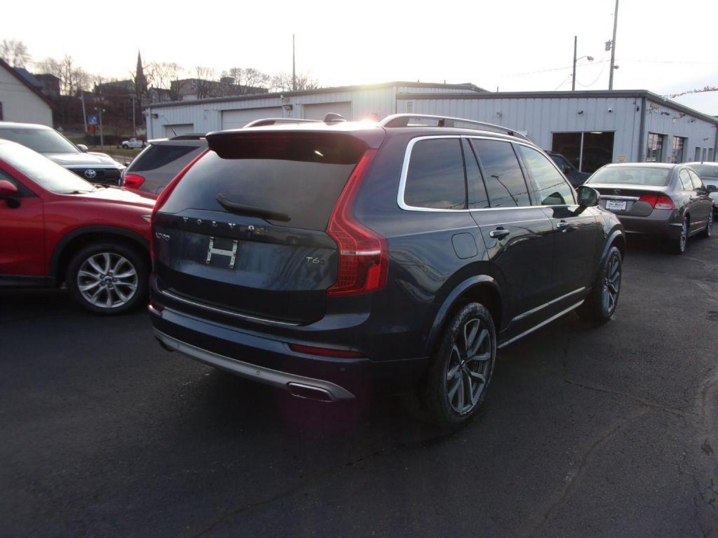 2019 BLUE VOLVO XC90 T6 MOMENTUM (YV4A22PK8K1) with an 2.0L engine, Automatic transmission, located at 501 E. Columbia St., Springfield, OH, 45503, (800) 262-7122, 39.925262, -83.801796 - *** 1 Owner *** LOADED *** Serviced and Detailed *** Third Row Seating *** PERFORMANCE 2.0L Super and Turbo-Charged, Direct Inject Engine 8-Speed Geartronic Automatic Trans w/ Start-Stop 316 HP @ 5700 RPM and 295 lb-ft Torque @ 2200 RPM All-Wheel-Drive with Instant Traction Electric Power - Photo#3