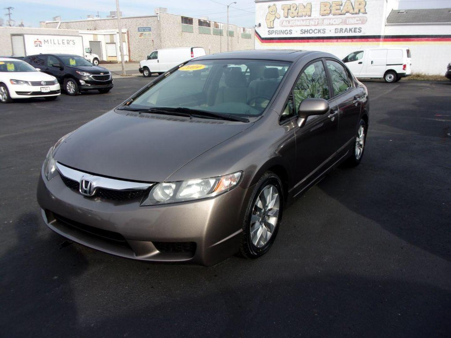 2009 GRAY HONDA CIVIC EX (1HGFA168X9L) with an 1.8L engine, Automatic transmission, located at 501 E. Columbia St., Springfield, OH, 45503, (800) 262-7122, 39.925262, -83.801796 - *** Serviced and Detailed *** New Shocks *** EX *** New Tires *** Jay North Auto has offered hand picked vehicles since 1965! Our customer's enjoy a NO pressure buying experience with a small town feel. All of our vehicles get fully inspected and detailed. We are a preferred dealer for many loca - Photo#6