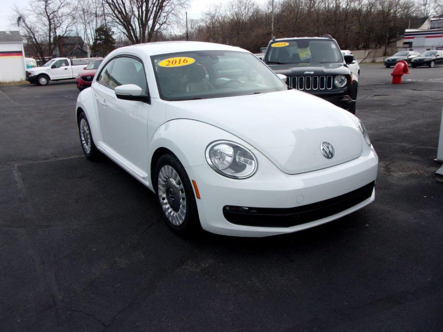 2016 WHITE VOLKSWAGEN BEETLE SE (3VWJ17AT2GM) with an 1.8L engine, Automatic transmission, located at 501 E. Columbia St., Springfield, OH, 45503, (800) 262-7122, 39.925262, -83.801796 - *** New Tires *** Clean CarFax w/ 2 Owners *** Serviced and Detailed *** SE *** Back Up Camera *** NICE!!! *** Jay North Auto has offered hand picked vehicles since 1965! Our customer's enjoy a NO pressure buying experience with a small town feel. All of our vehicles get fully inspected and deta - Photo#2