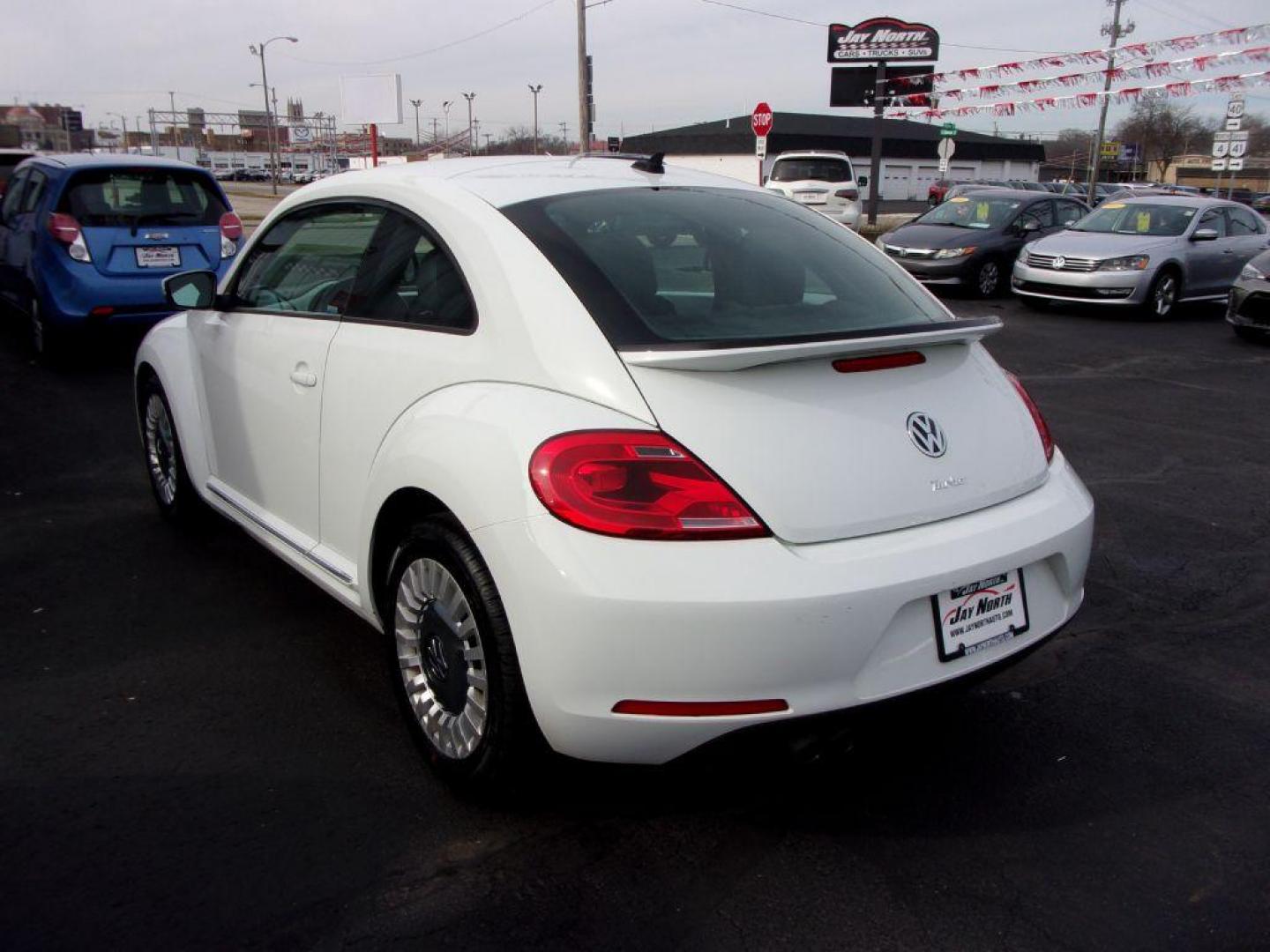 2016 WHITE VOLKSWAGEN BEETLE SE (3VWJ17AT2GM) with an 1.8L engine, Automatic transmission, located at 501 E. Columbia St., Springfield, OH, 45503, (800) 262-7122, 39.925262, -83.801796 - *** New Tires *** Clean CarFax w/ 2 Owners *** Serviced and Detailed *** SE *** Back Up Camera *** NICE!!! *** Jay North Auto has offered hand picked vehicles since 1965! Our customer's enjoy a NO pressure buying experience with a small town feel. All of our vehicles get fully inspected and deta - Photo#5