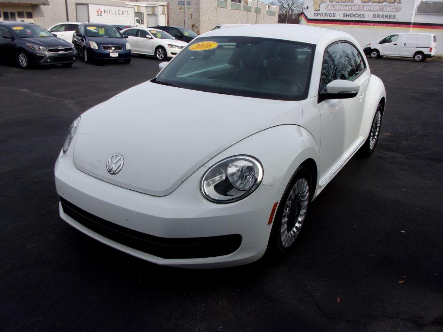 2016 WHITE VOLKSWAGEN BEETLE SE (3VWJ17AT2GM) with an 1.8L engine, Automatic transmission, located at 501 E. Columbia St., Springfield, OH, 45503, (800) 262-7122, 39.925262, -83.801796 - *** New Tires *** Clean CarFax w/ 2 Owners *** Serviced and Detailed *** SE *** Back Up Camera *** NICE!!! *** Jay North Auto has offered hand picked vehicles since 1965! Our customer's enjoy a NO pressure buying experience with a small town feel. All of our vehicles get fully inspected and deta - Photo#6