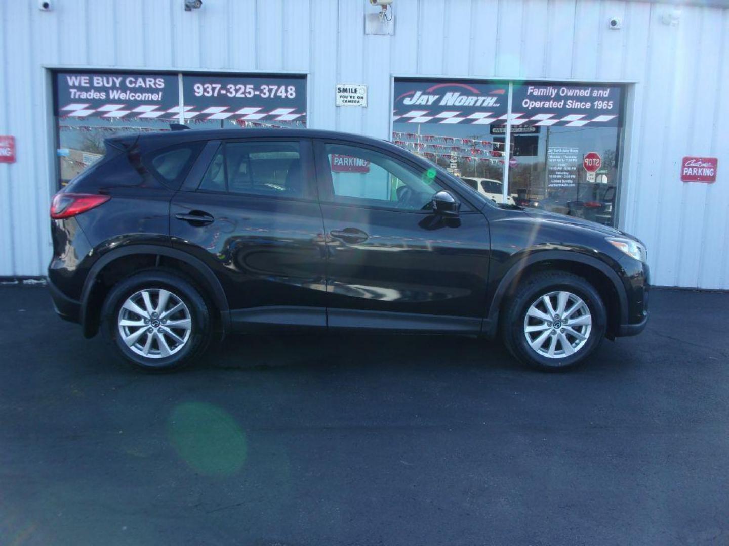 2013 BLACK MAZDA CX-5 SPORT (JM3KE2BE9D0) with an 2.0L engine, 6-Speed Manual transmission, located at 501 E. Columbia St., Springfield, OH, 45503, (800) 262-7122, 39.925262, -83.801796 - Photo#1