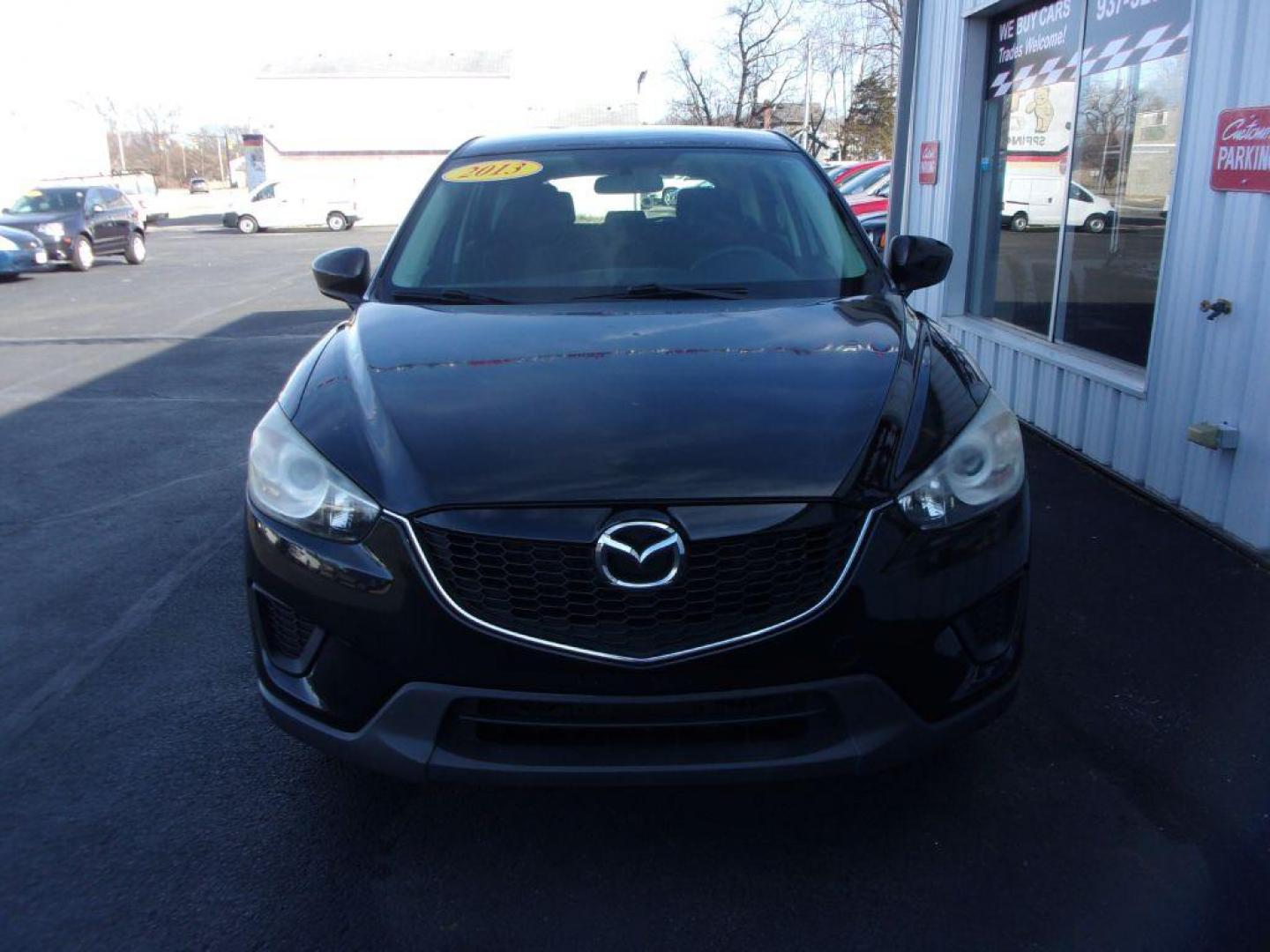 2013 BLACK MAZDA CX-5 SPORT (JM3KE2BE9D0) with an 2.0L engine, 6-Speed Manual transmission, located at 501 E. Columbia St., Springfield, OH, 45503, (800) 262-7122, 39.925262, -83.801796 - Photo#2