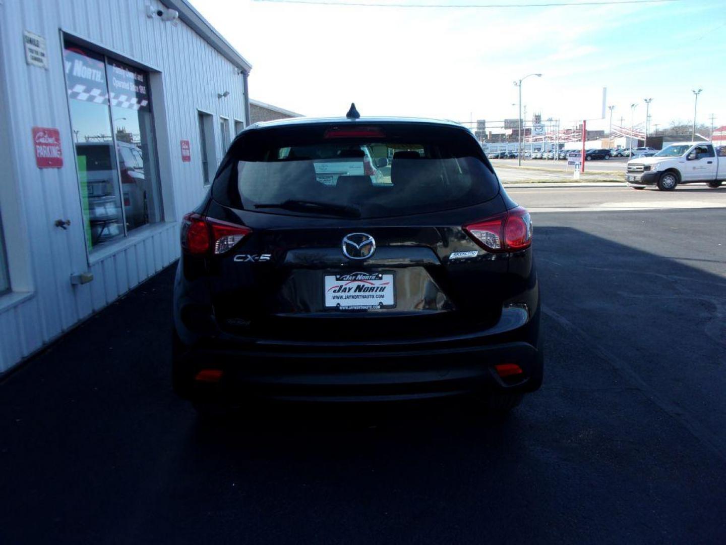 2013 BLACK MAZDA CX-5 SPORT (JM3KE2BE9D0) with an 2.0L engine, 6-Speed Manual transmission, located at 501 E. Columbia St., Springfield, OH, 45503, (800) 262-7122, 39.925262, -83.801796 - Photo#4