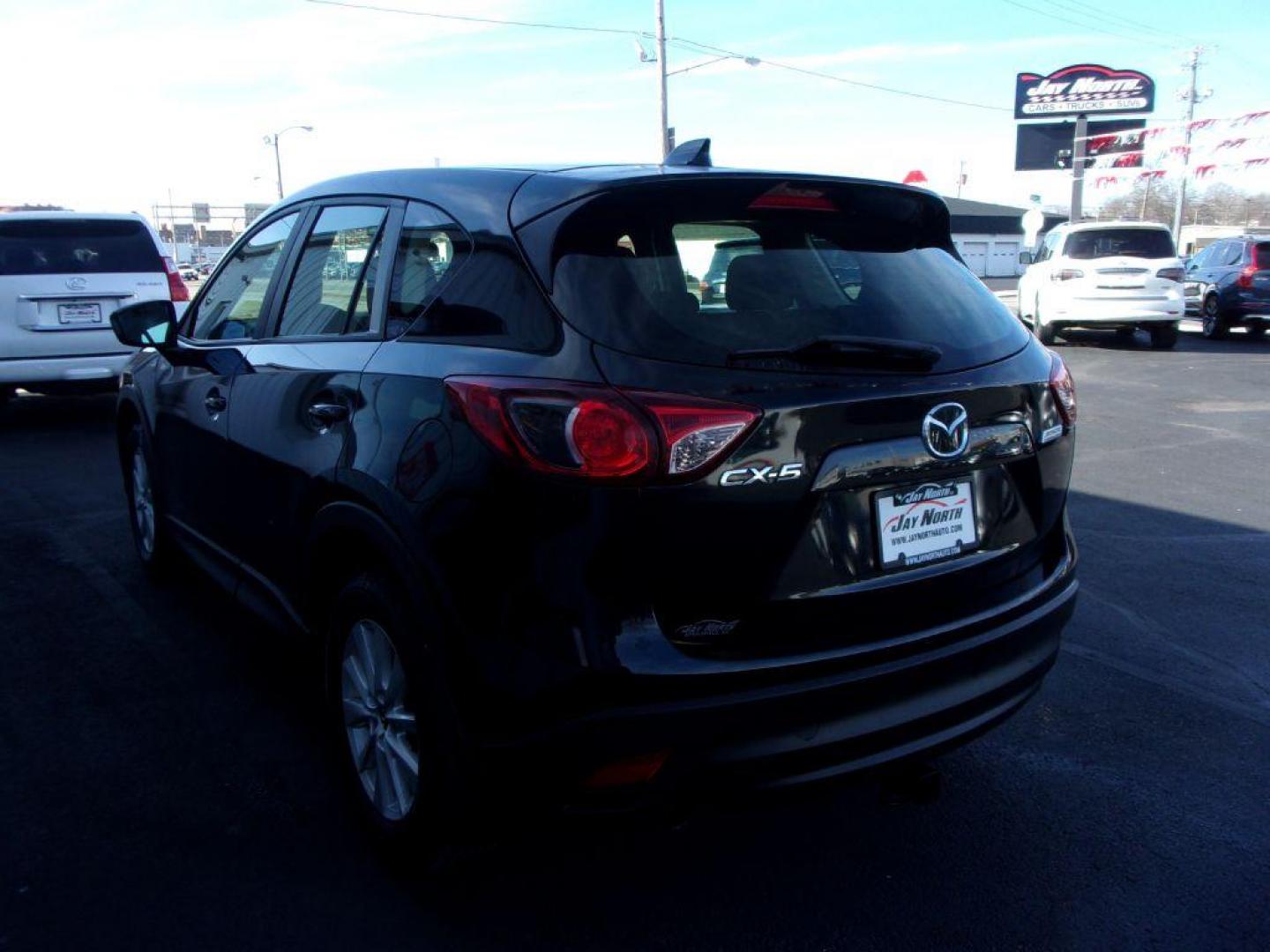 2013 BLACK MAZDA CX-5 SPORT (JM3KE2BE9D0) with an 2.0L engine, 6-Speed Manual transmission, located at 501 E. Columbia St., Springfield, OH, 45503, (800) 262-7122, 39.925262, -83.801796 - Photo#5