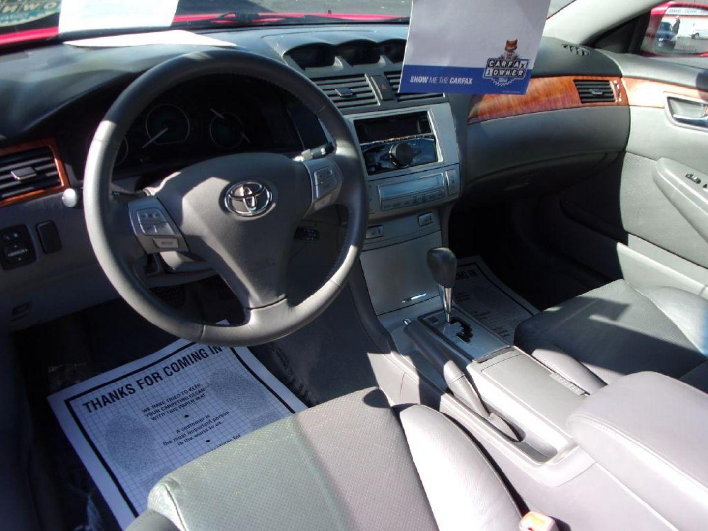 2008 RED TOYOTA CAMRY SOLARA SLE (4T1CA30P68U) with an 3.3L engine, Automatic transmission, located at 501 E. Columbia St., Springfield, OH, 45503, (800) 262-7122, 39.925262, -83.801796 - *** 1 Owner w/ 37 Service records on CarFax including timing belt service at Toyota Dealer *** V6 FWD *** Heated Leather Seating *** Moonroof *** SHARP!! *** Jay North Auto has offered hand picked vehicles since 1965! Our customer's enjoy a NO pressure buying experience with a small town feel. - Photo#9