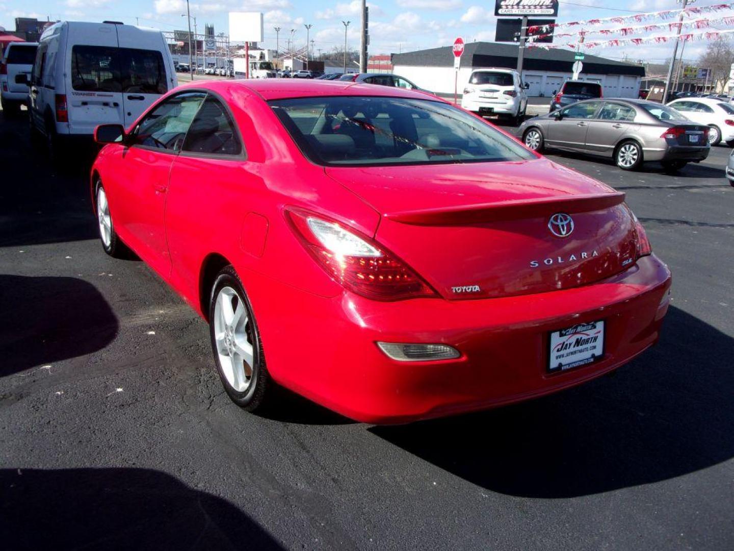 2008 RED TOYOTA CAMRY SOLARA SLE (4T1CA30P68U) with an 3.3L engine, Automatic transmission, located at 501 E. Columbia St., Springfield, OH, 45503, (800) 262-7122, 39.925262, -83.801796 - *** 1 Owner w/ 37 Service records on CarFax including timing belt service at Toyota Dealer *** V6 FWD *** Heated Leather Seating *** Moonroof *** SHARP!! *** Jay North Auto has offered hand picked vehicles since 1965! Our customer's enjoy a NO pressure buying experience with a small town feel. - Photo#4