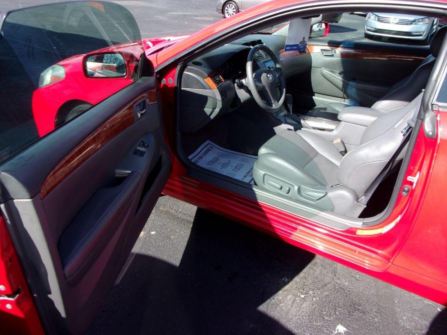 2008 RED TOYOTA CAMRY SOLARA SLE (4T1CA30P68U) with an 3.3L engine, Automatic transmission, located at 501 E. Columbia St., Springfield, OH, 45503, (800) 262-7122, 39.925262, -83.801796 - *** 1 Owner w/ 37 Service records on CarFax including timing belt service at Toyota Dealer *** V6 FWD *** Heated Leather Seating *** Moonroof *** SHARP!! *** Jay North Auto has offered hand picked vehicles since 1965! Our customer's enjoy a NO pressure buying experience with a small town feel. - Photo#8