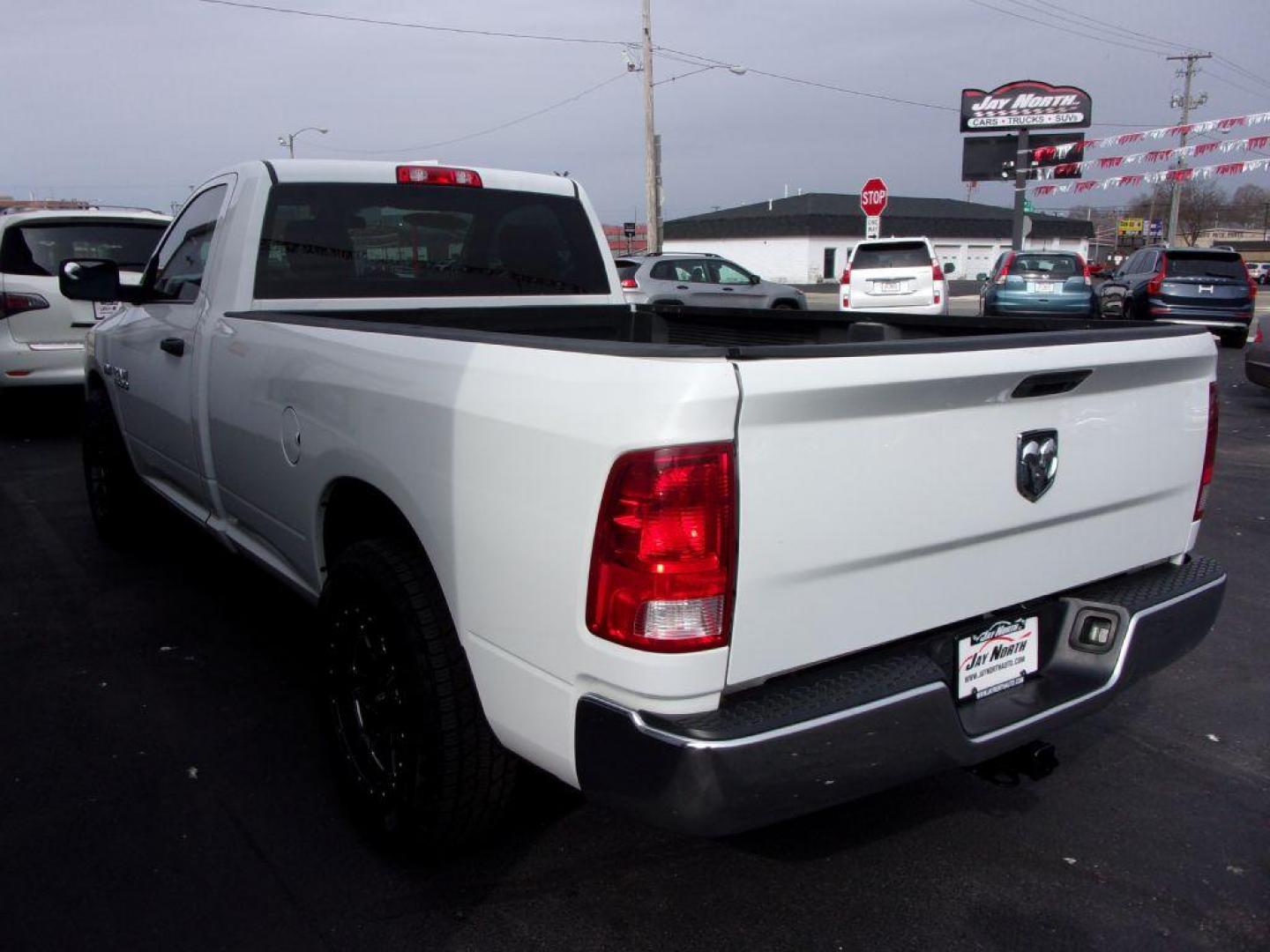 2016 WHITE RAM 1500 TRADESMAN (3C6JR6DT8GG) with an 5.7L engine, Automatic transmission, located at 501 E. Columbia St., Springfield, OH, 45503, (800) 262-7122, 39.925262, -83.801796 - *** 5.7L Hemi *** ST ** Newer Wheels and Tires *** Serviced and Detailed *** Tradesman PKG *** Jay North Auto has offered hand picked vehicles since 1965! Our customer's enjoy a NO pressure buying experience with a small town feel. All of our vehicles get fully inspected and detailed. We are a p - Photo#6