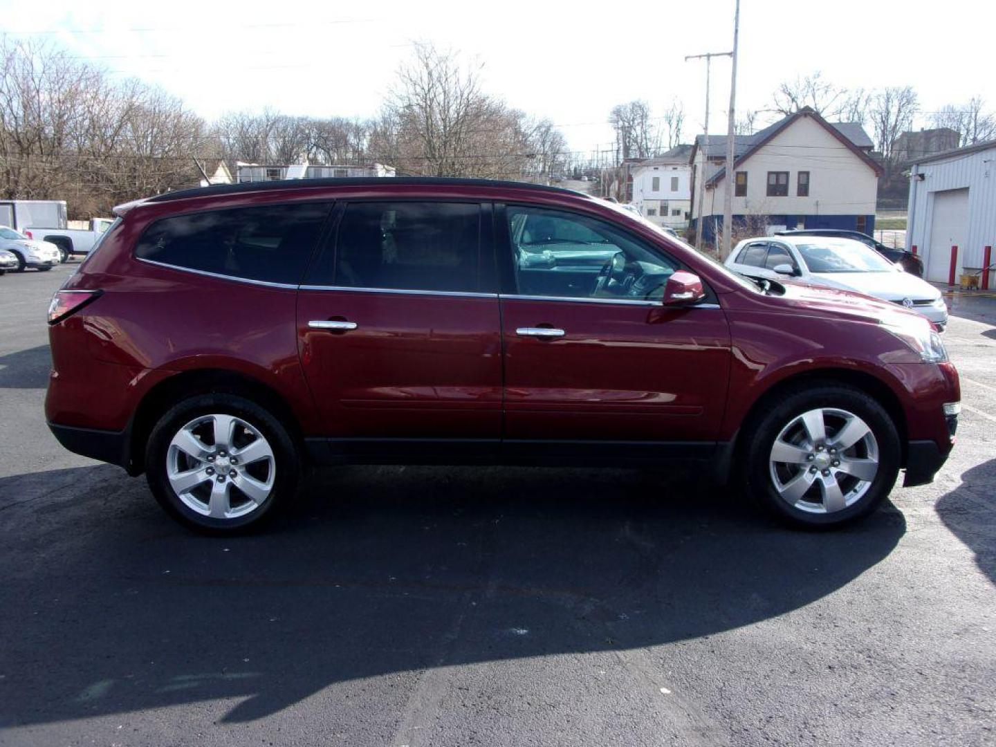 2017 RED CHEVROLET TRAVERSE LT (1GNKRGKD6HJ) with an 3.6L engine, Automatic transmission, located at 501 E. Columbia St., Springfield, OH, 45503, (800) 262-7122, 39.925262, -83.801796 - *** LT *** FWD *** 3rd Row Seating *** Remote Start *** Serviced and Detailed *** Jay North Auto has offered hand picked vehicles since 1965! Our customer's enjoy a NO pressure buying experience with a small town feel. All of our vehicles get fully inspected and detailed. We are a preferred deal - Photo#0