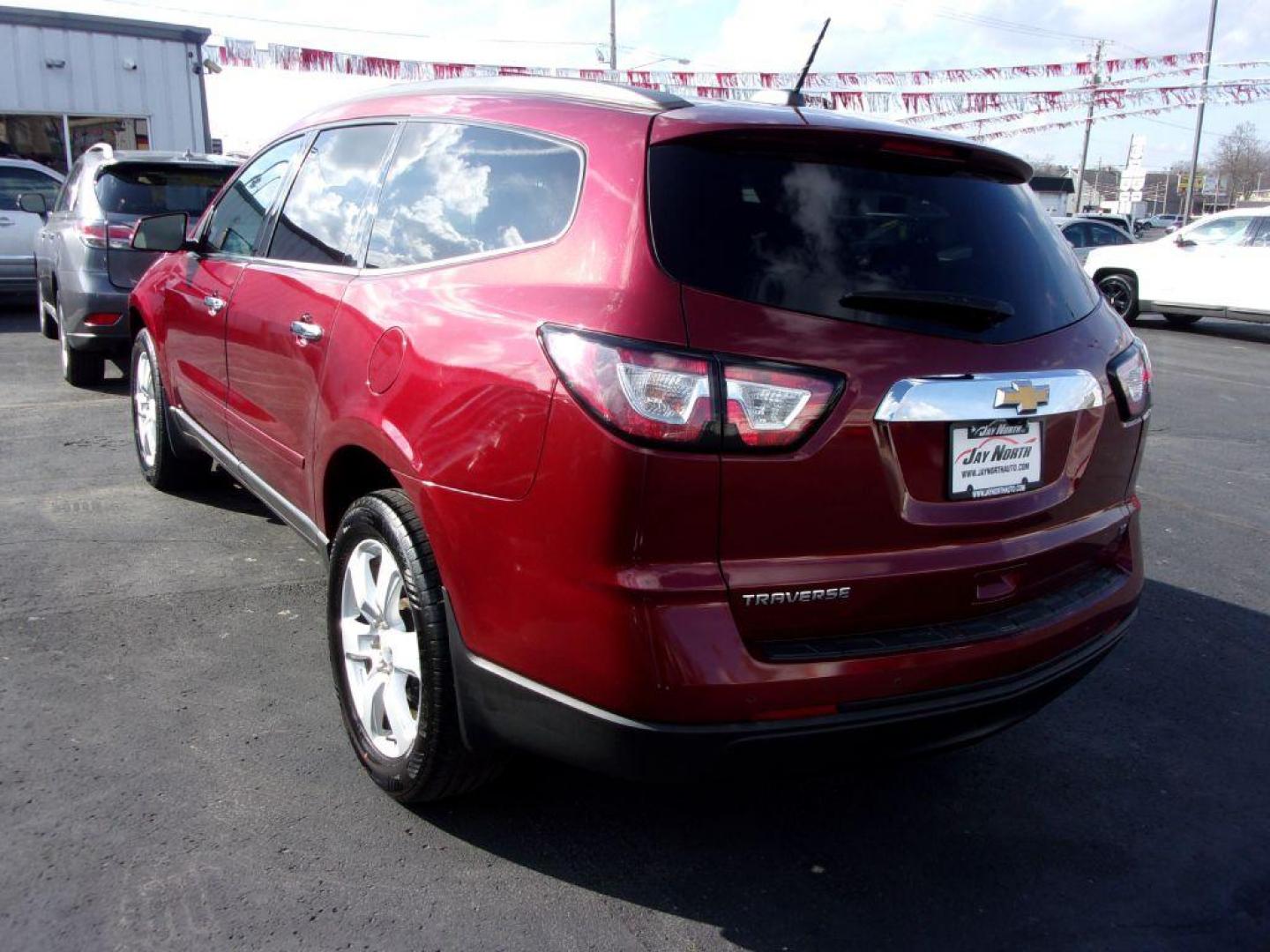 2017 RED CHEVROLET TRAVERSE LT (1GNKRGKD6HJ) with an 3.6L engine, Automatic transmission, located at 501 E. Columbia St., Springfield, OH, 45503, (800) 262-7122, 39.925262, -83.801796 - *** LT *** FWD *** 3rd Row Seating *** Remote Start *** Serviced and Detailed *** Jay North Auto has offered hand picked vehicles since 1965! Our customer's enjoy a NO pressure buying experience with a small town feel. All of our vehicles get fully inspected and detailed. We are a preferred deal - Photo#14