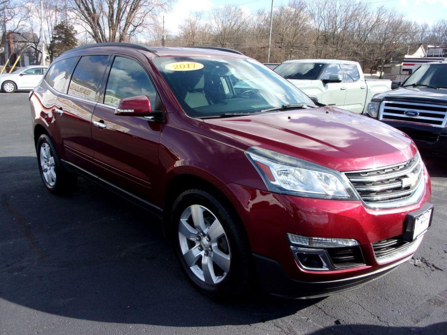 2017 RED CHEVROLET TRAVERSE LT (1GNKRGKD6HJ) with an 3.6L engine, Automatic transmission, located at 501 E. Columbia St., Springfield, OH, 45503, (800) 262-7122, 39.925262, -83.801796 - *** LT *** FWD *** 3rd Row Seating *** Remote Start *** Serviced and Detailed *** Jay North Auto has offered hand picked vehicles since 1965! Our customer's enjoy a NO pressure buying experience with a small town feel. All of our vehicles get fully inspected and detailed. We are a preferred deal - Photo#1