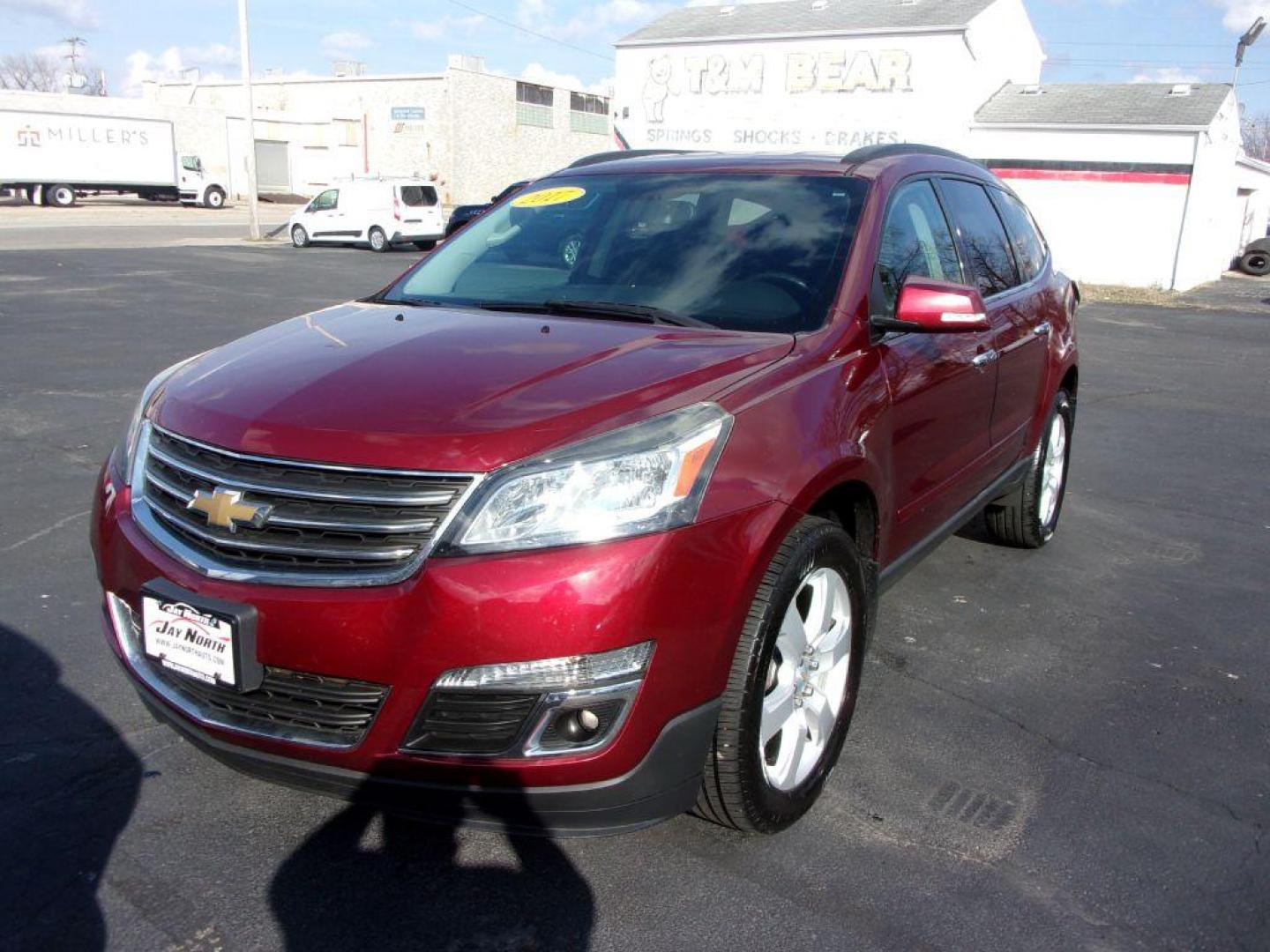 2017 RED CHEVROLET TRAVERSE LT (1GNKRGKD6HJ) with an 3.6L engine, Automatic transmission, located at 501 E. Columbia St., Springfield, OH, 45503, (800) 262-7122, 39.925262, -83.801796 - *** LT *** FWD *** 3rd Row Seating *** Remote Start *** Serviced and Detailed *** Jay North Auto has offered hand picked vehicles since 1965! Our customer's enjoy a NO pressure buying experience with a small town feel. All of our vehicles get fully inspected and detailed. We are a preferred deal - Photo#2